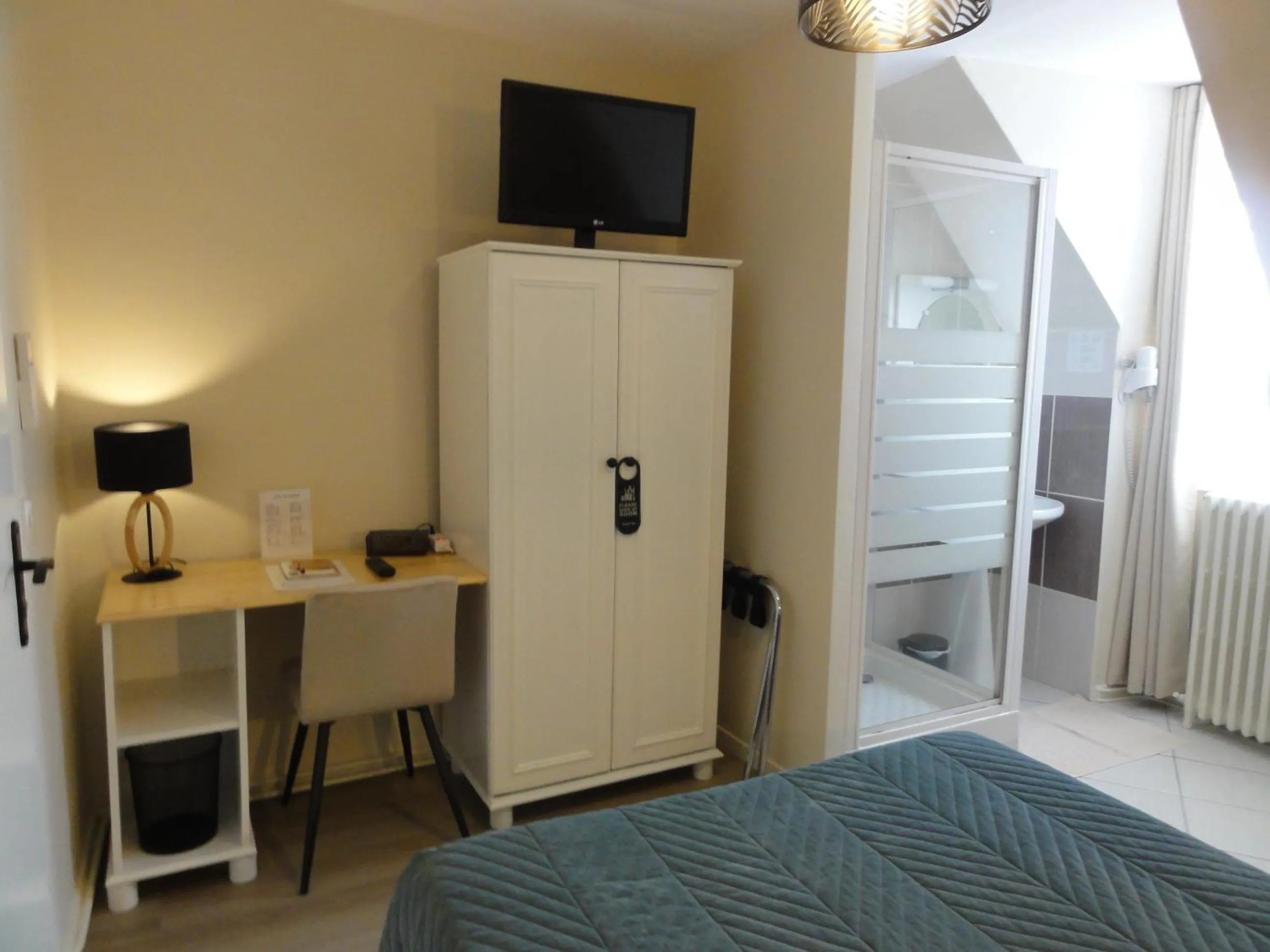 Bed in Hotel des Voyageurs