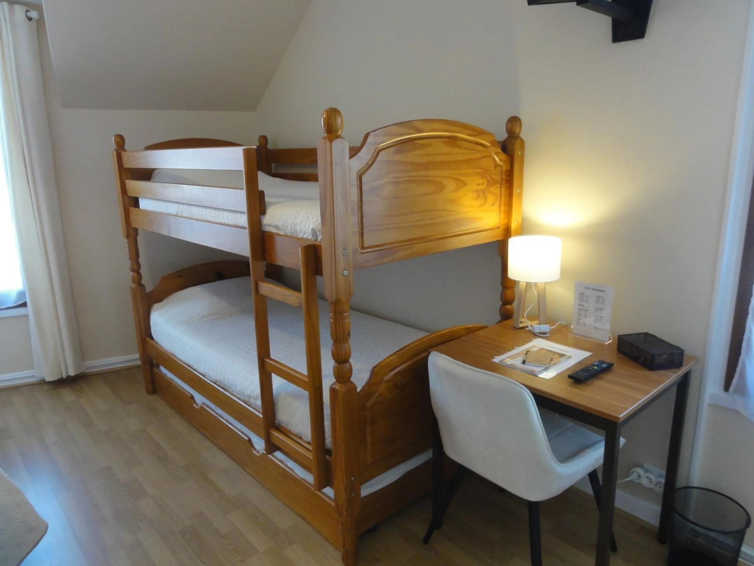 Bed in Hotel des Voyageurs