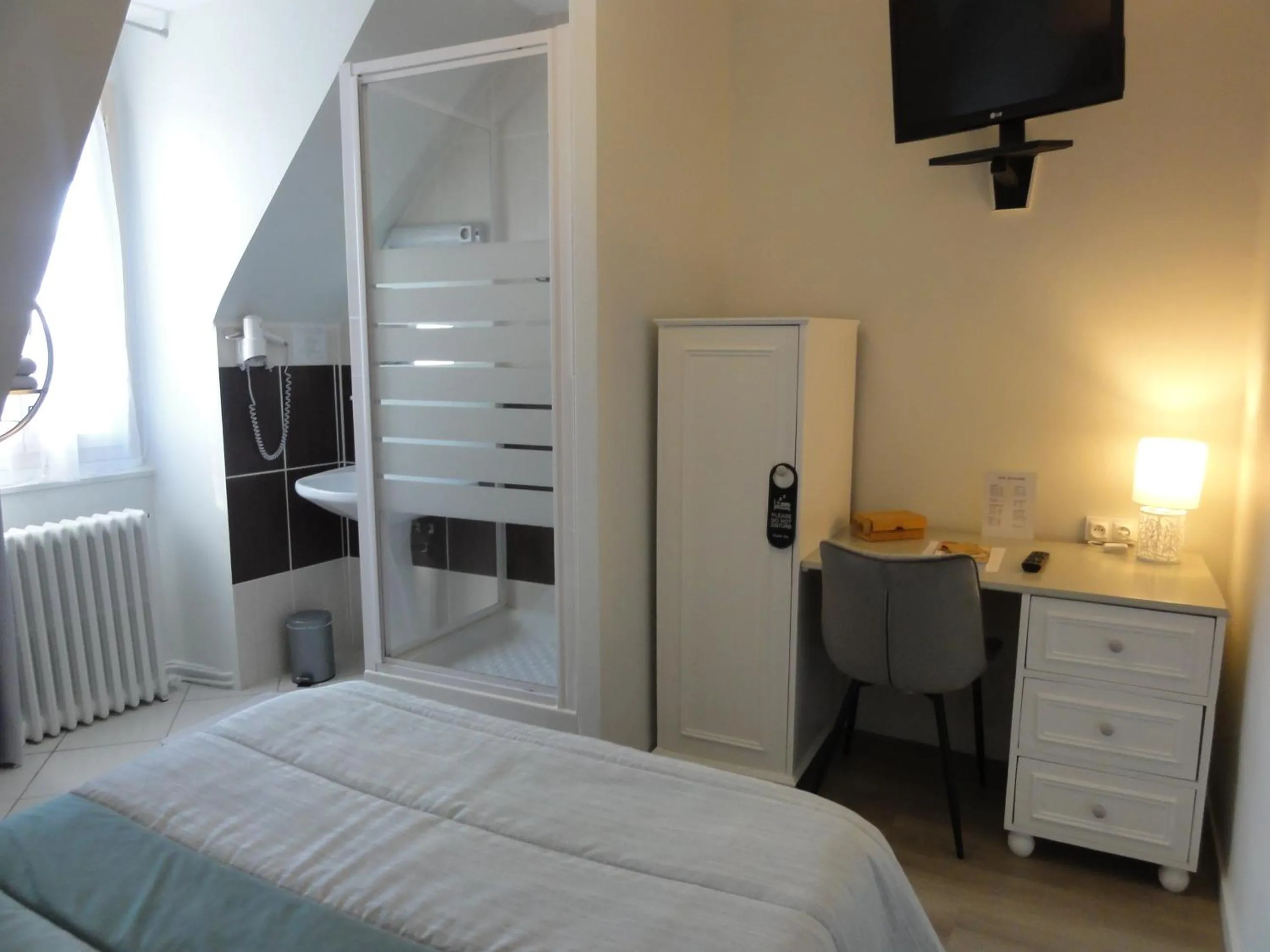 Bed in Hotel des Voyageurs