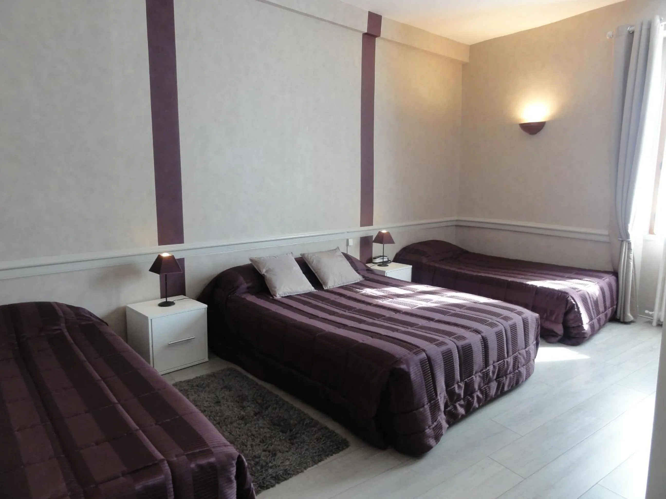 Bed in Hotel des Voyageurs