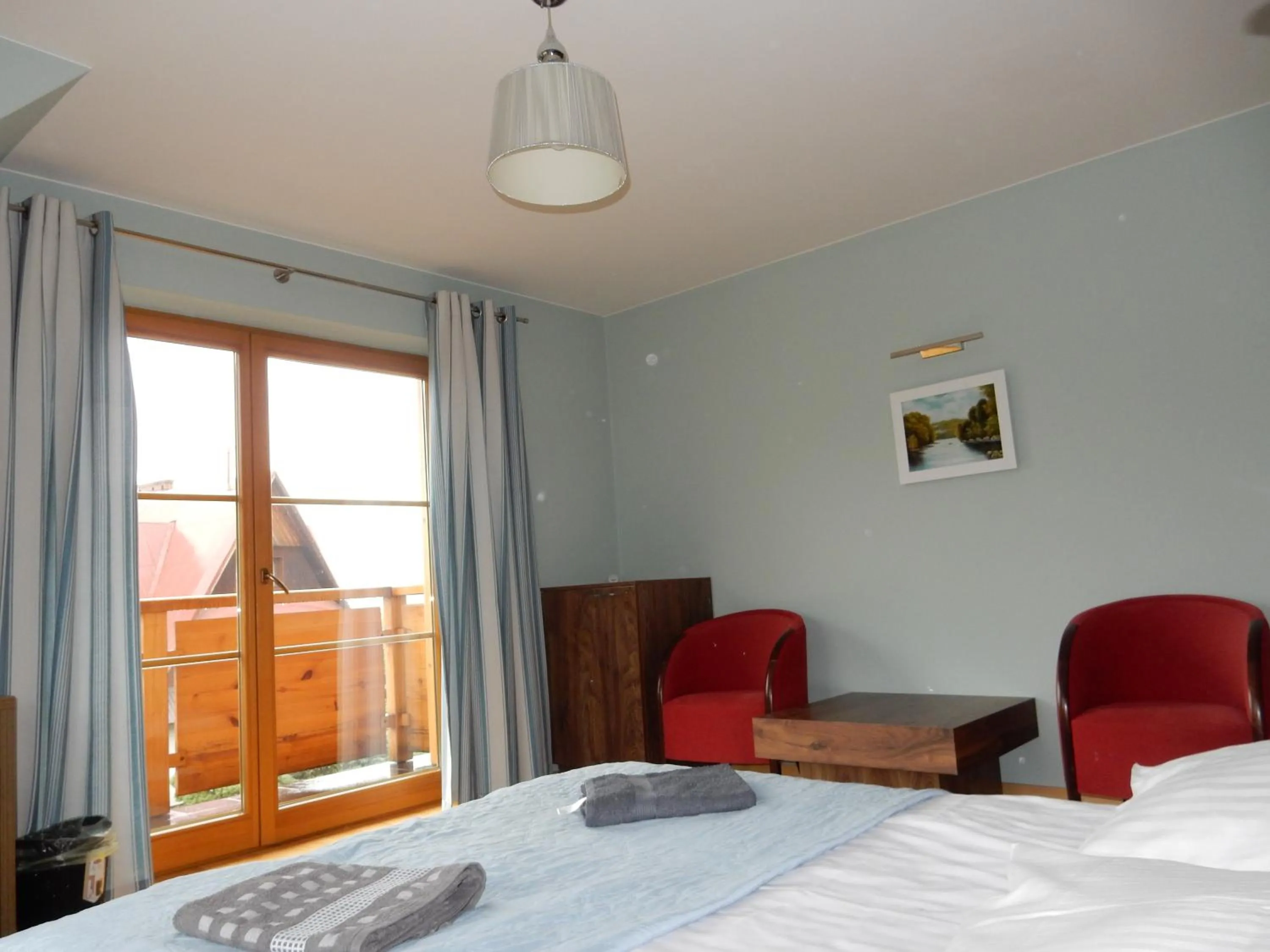 Photo of the whole room, Bed in Domek za Strugiem - pokoje i apartamenty