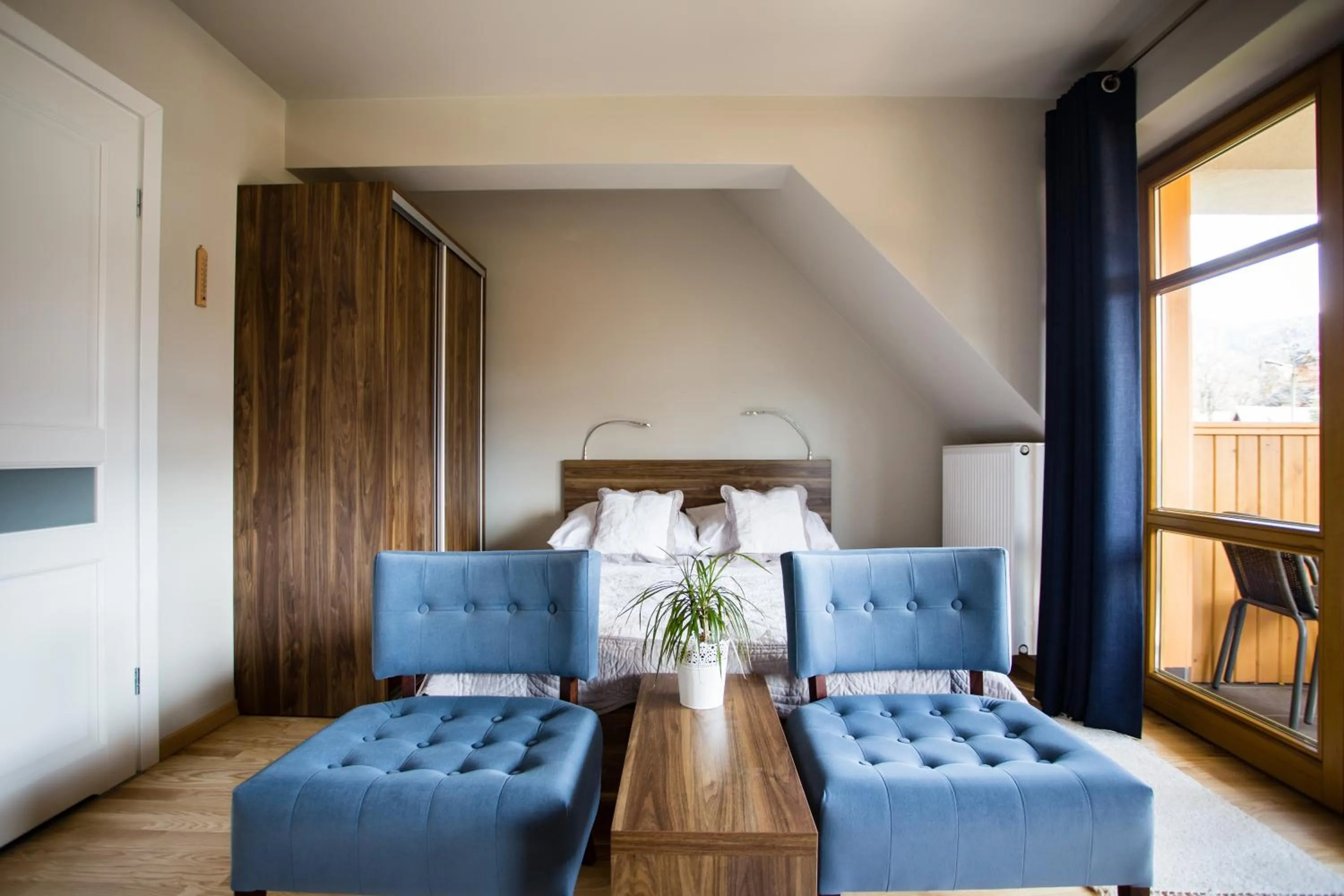 Photo of the whole room in Domek za Strugiem - pokoje i apartamenty