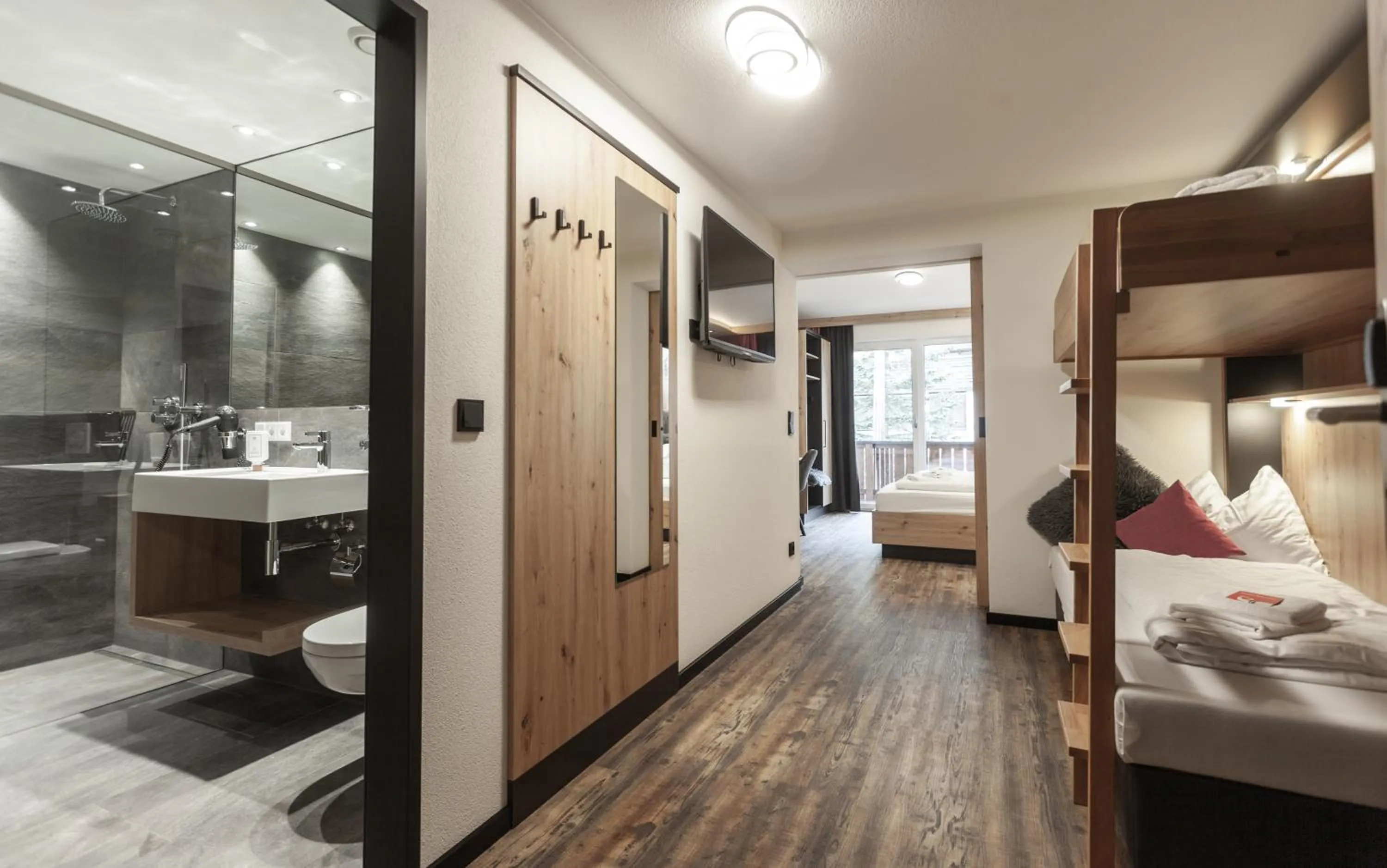 Photo of the whole room, Bed in first mountain Hotel Ötztal