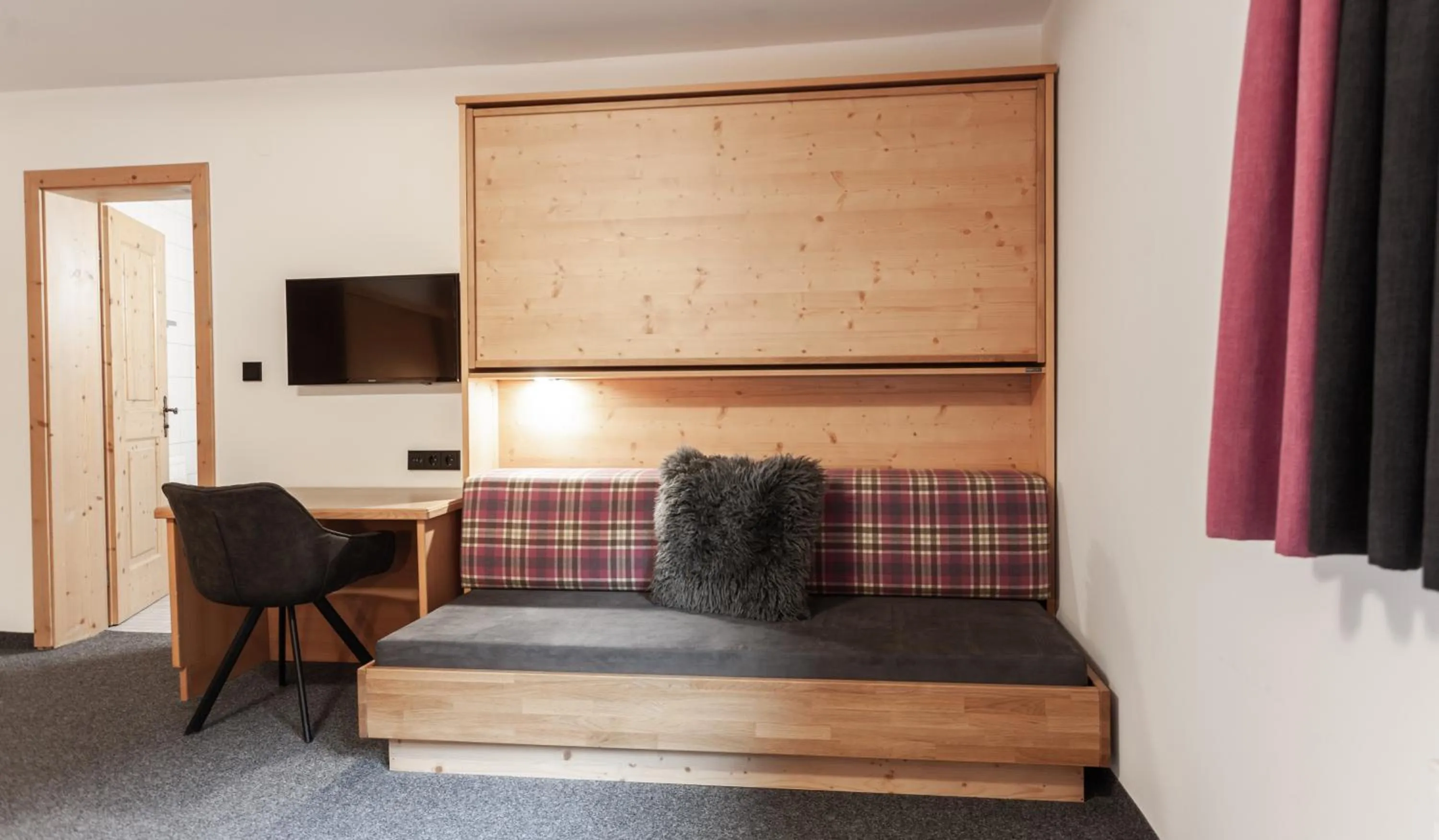 Photo of the whole room, Bed in first mountain Hotel Ötztal