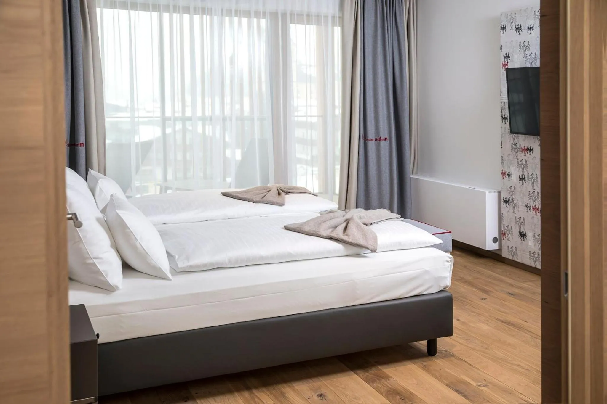 Photo of the whole room, Bed in Das Hohe Salve Sportresort, 4 Sterne Superior