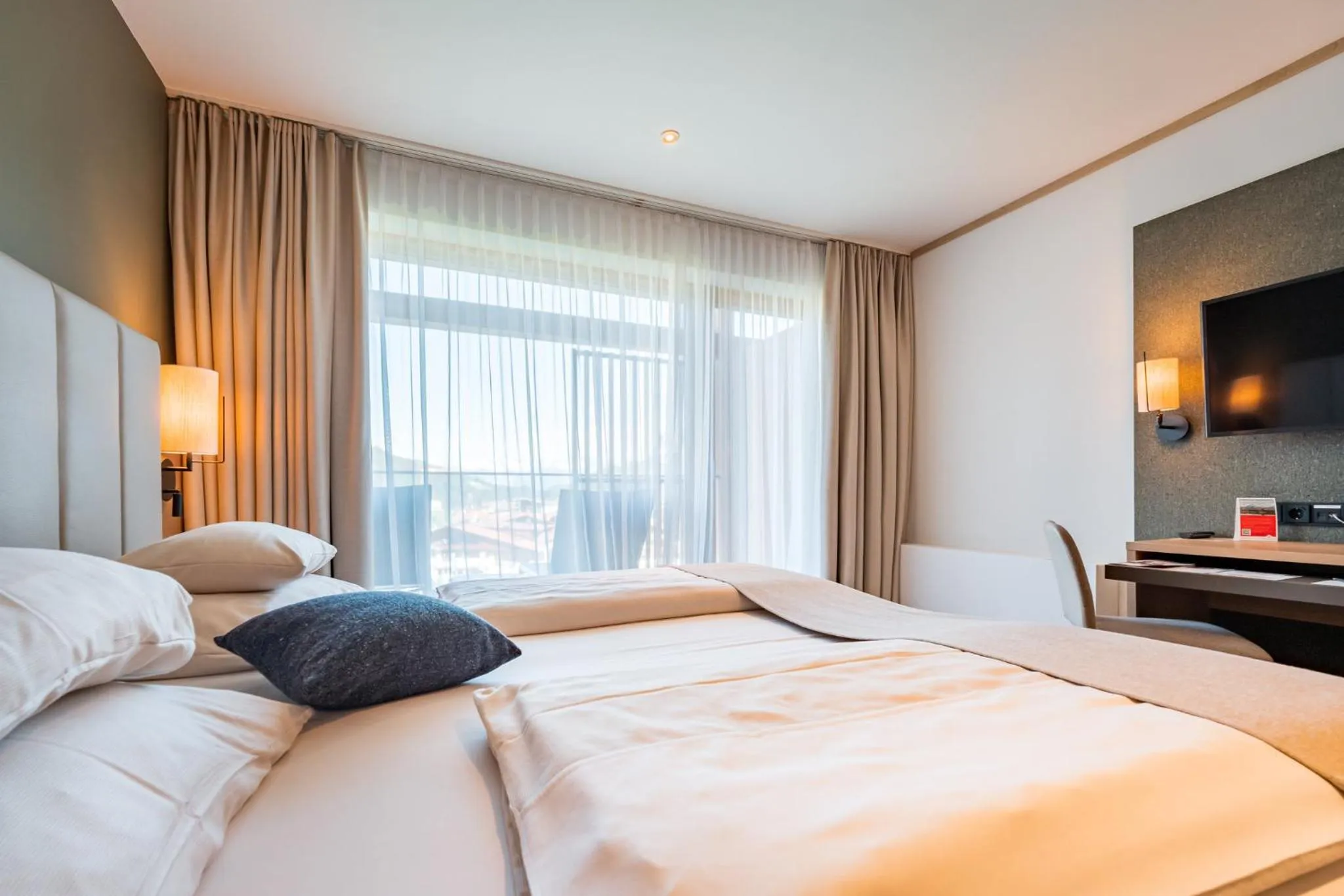 Bedroom, Bed in Das Hohe Salve Sportresort, 4 Sterne Superior