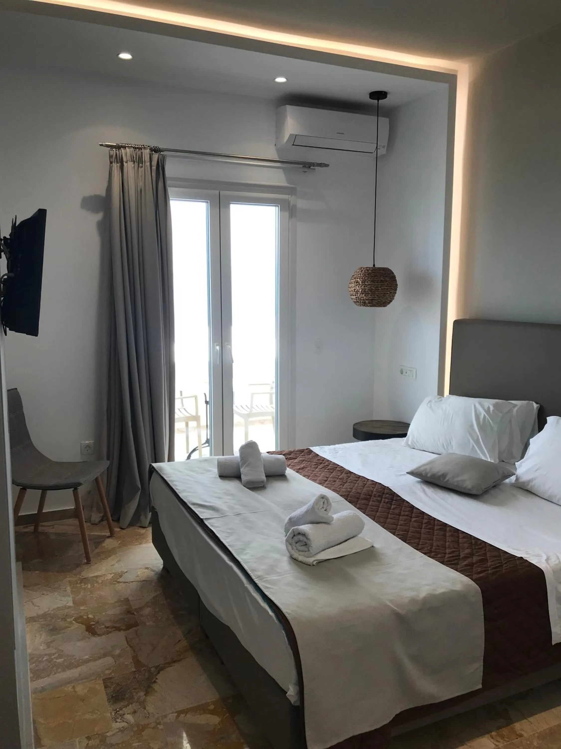 Bed in Kokkinos Villas