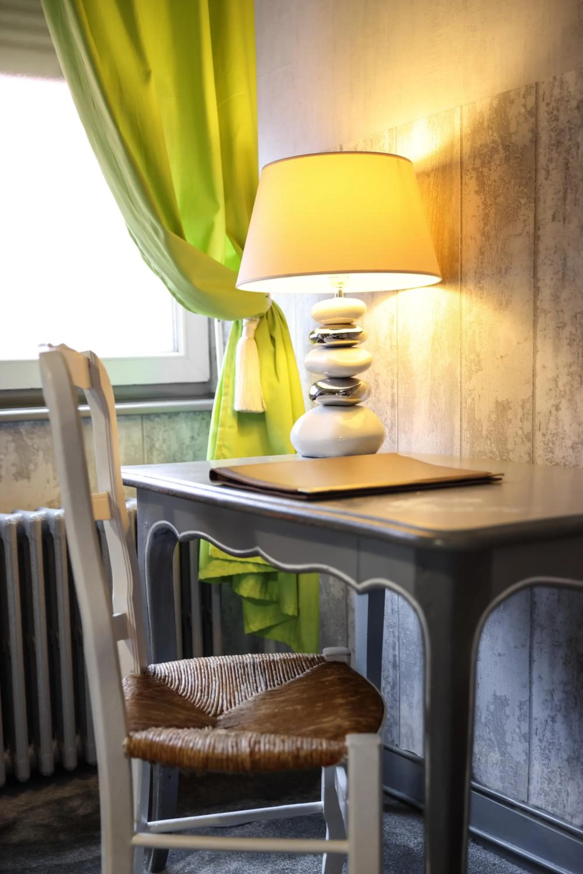 Seating area in Logis Hôtel-Restaurant Les Voyageurs