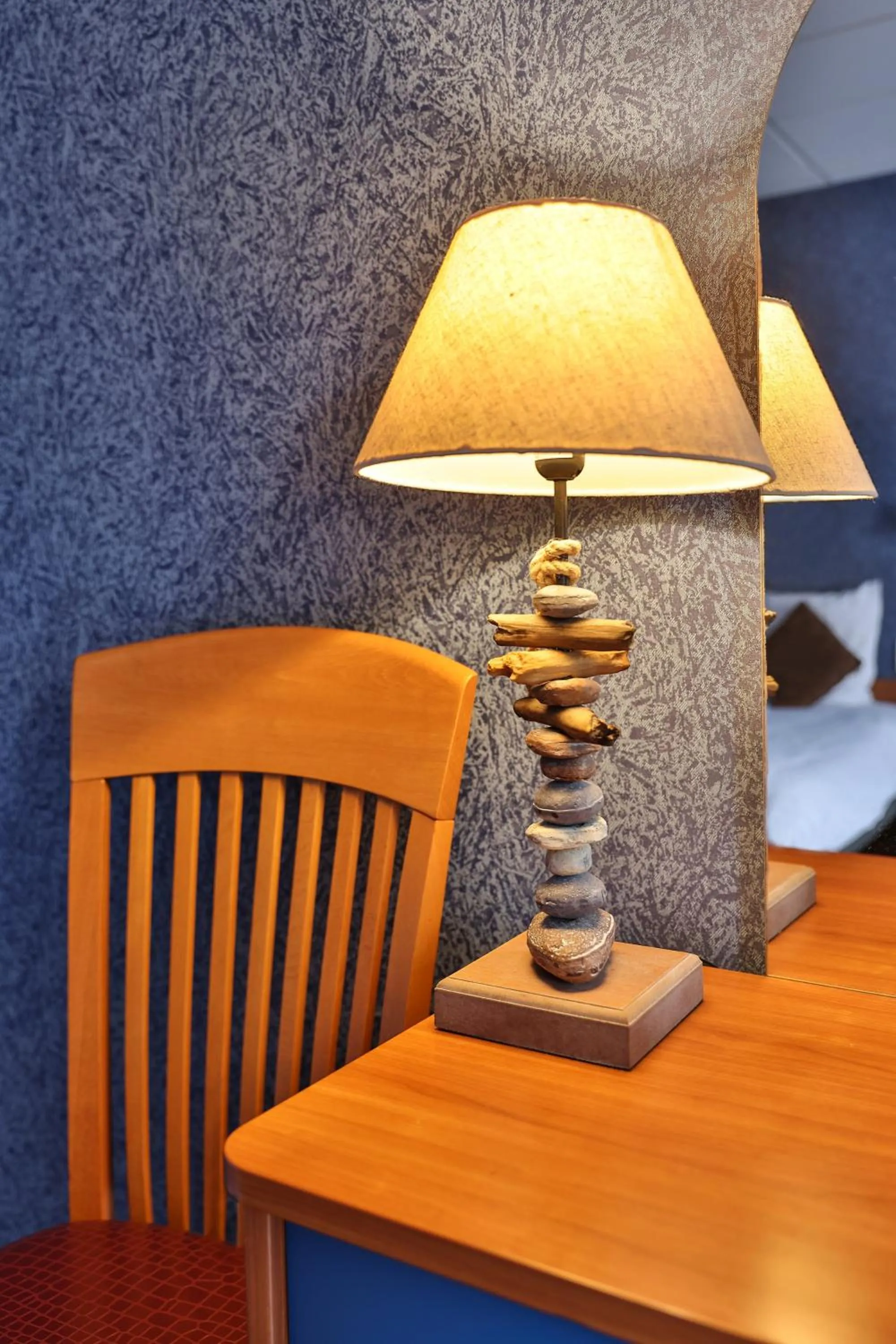 Bedroom in Logis Hôtel-Restaurant Les Voyageurs