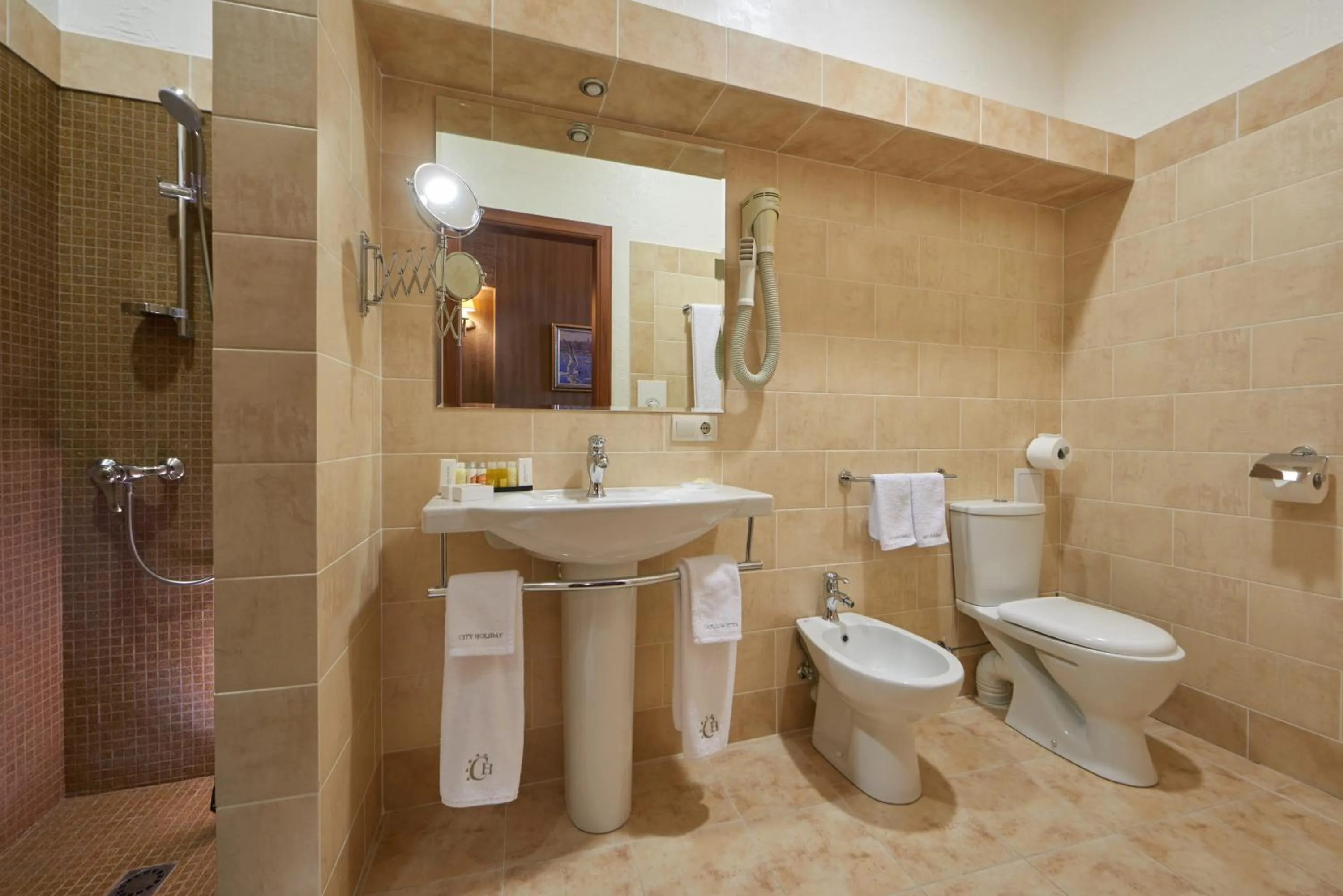 Shower in City Holiday Resort & SPA