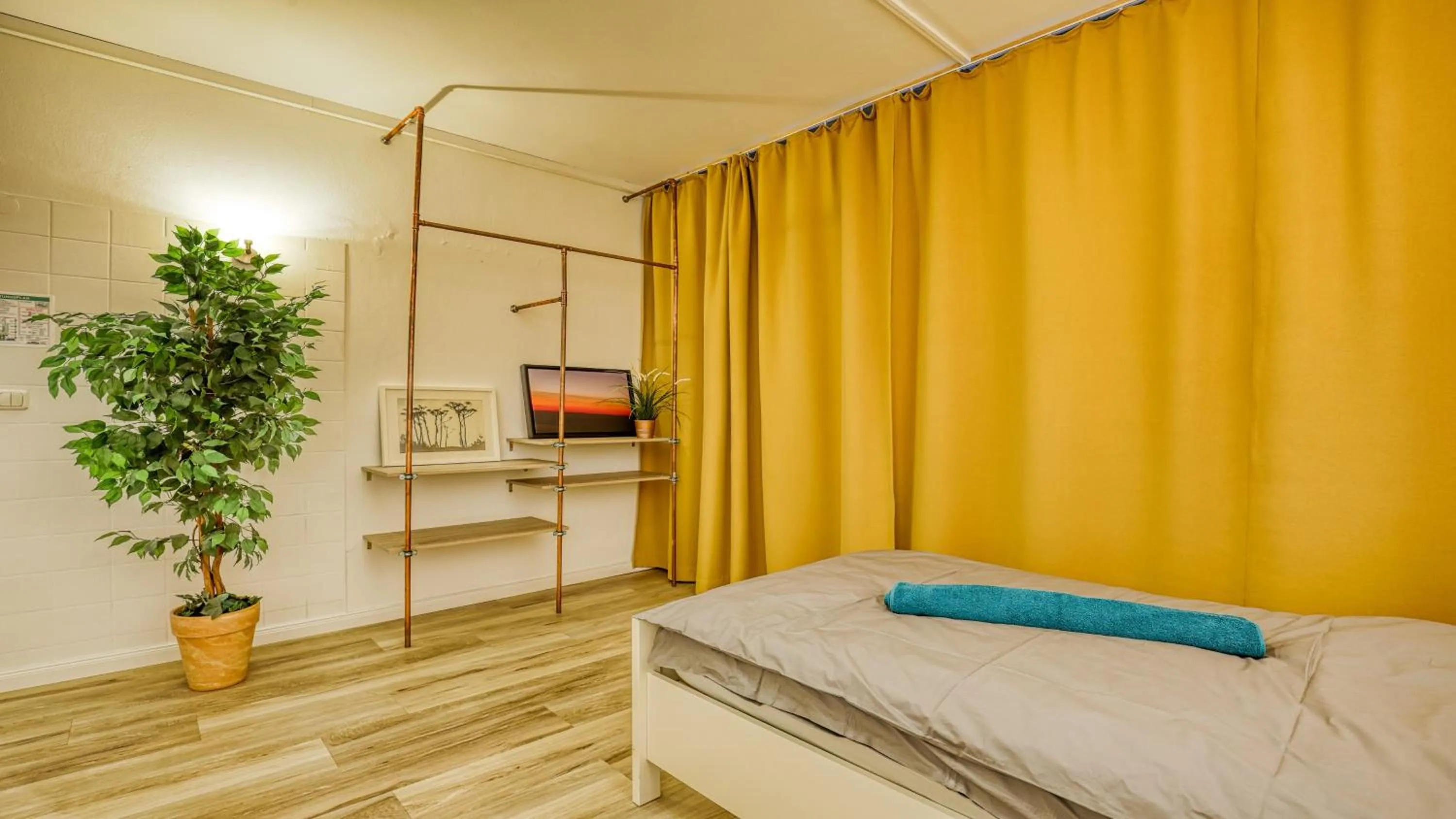 Photo of the whole room, Bed in Unperfekthotel CoWorkingHotel