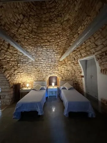 Bed in Masseria Colombo