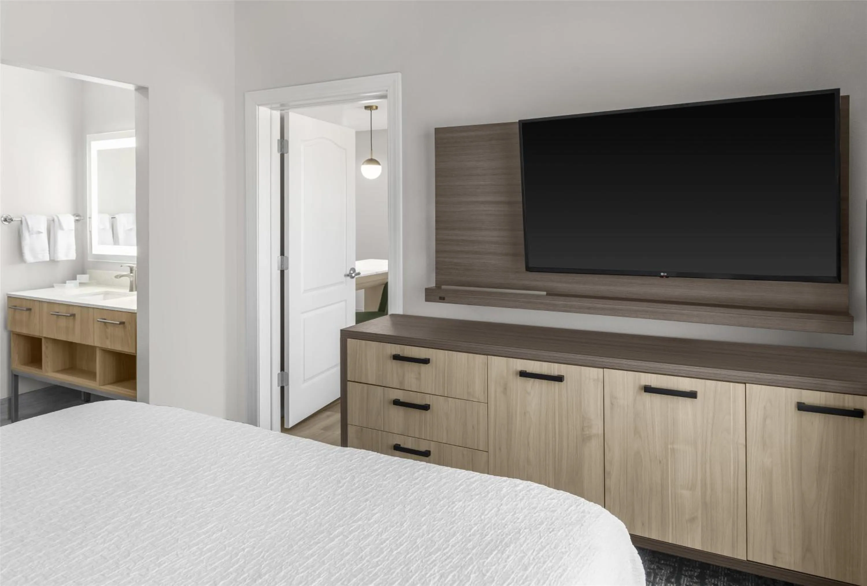 Bed in Homewood Suites by Hilton Fayetteville