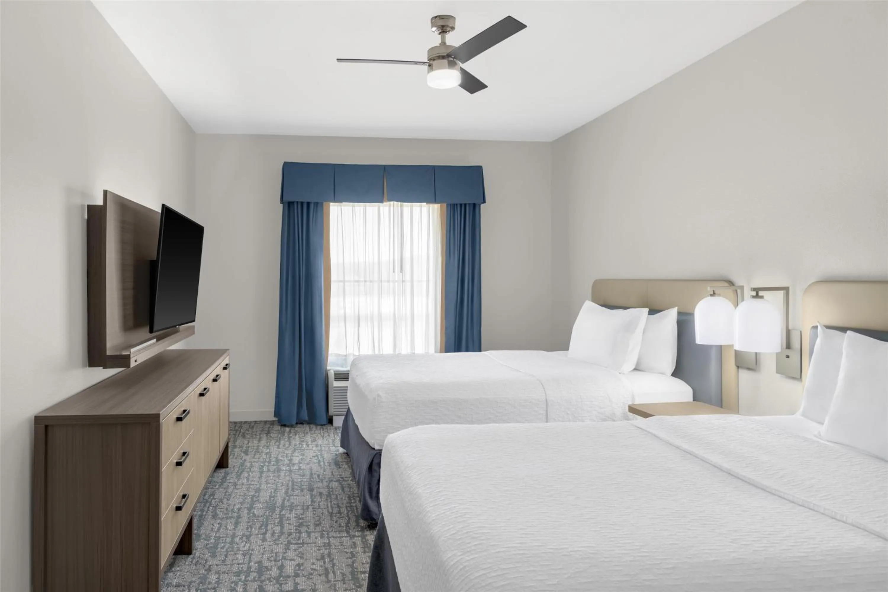 Bed in Homewood Suites by Hilton Fayetteville