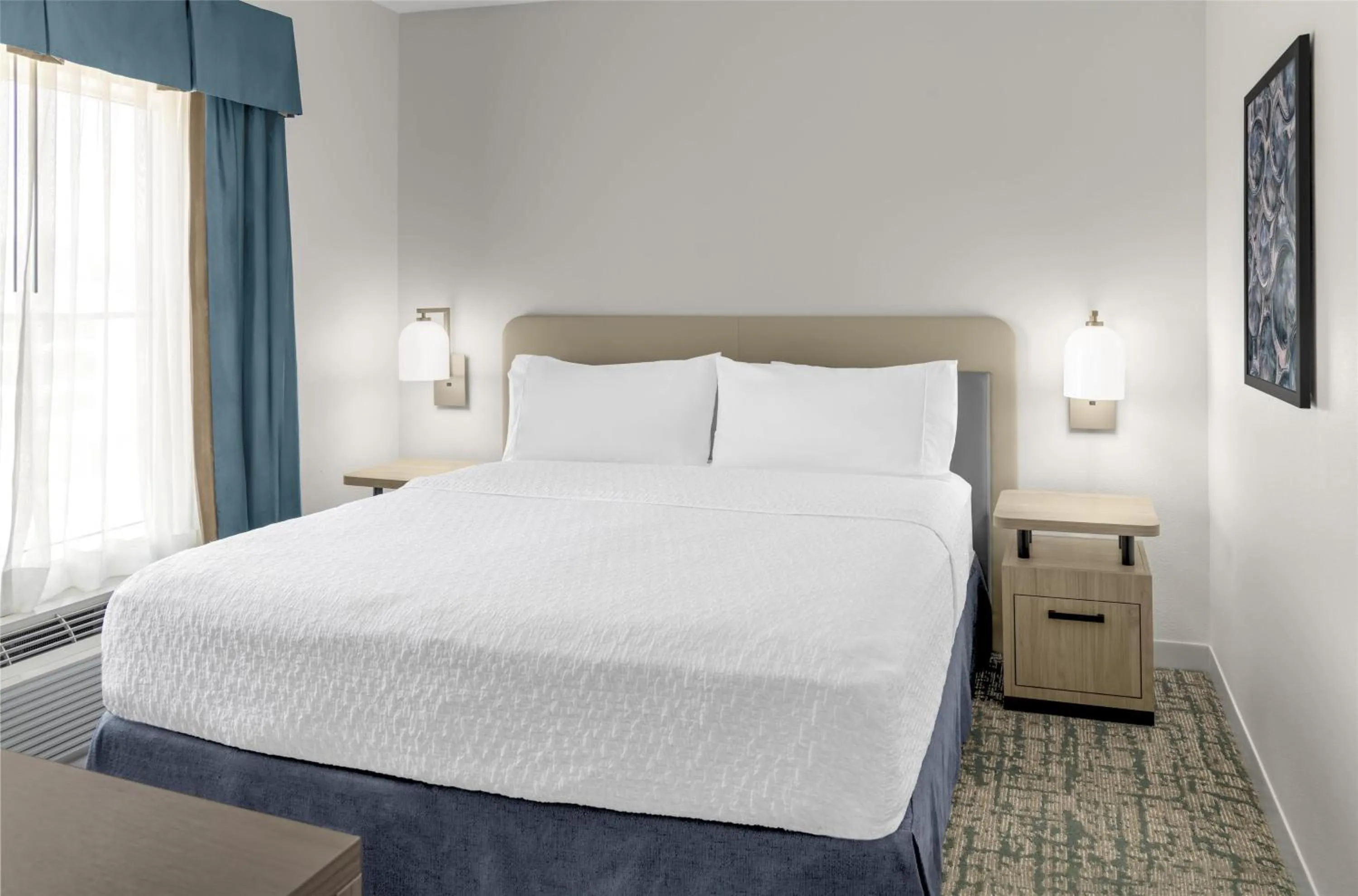 Bed in Homewood Suites by Hilton Fayetteville