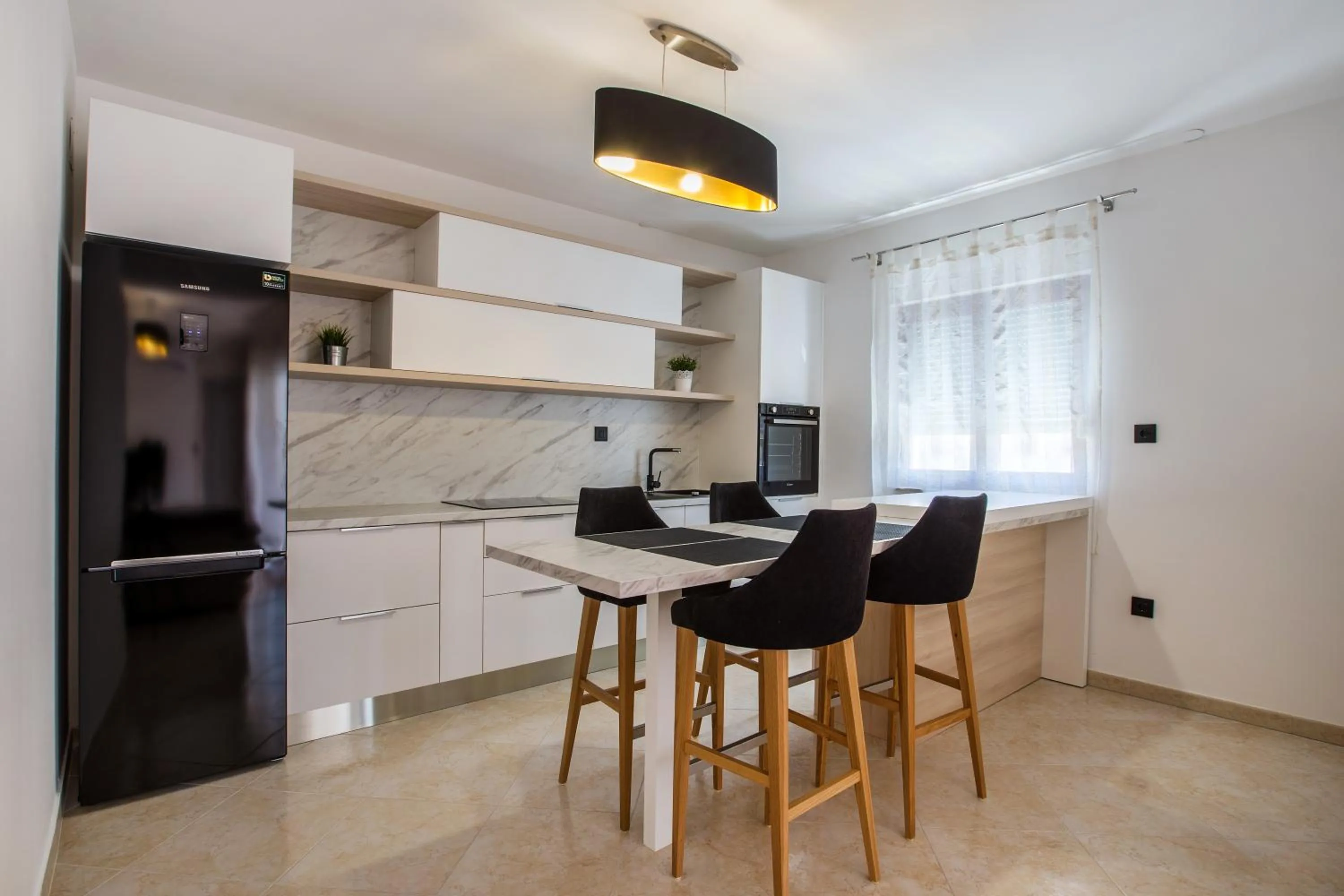 Kitchen or kitchenette in Villa M