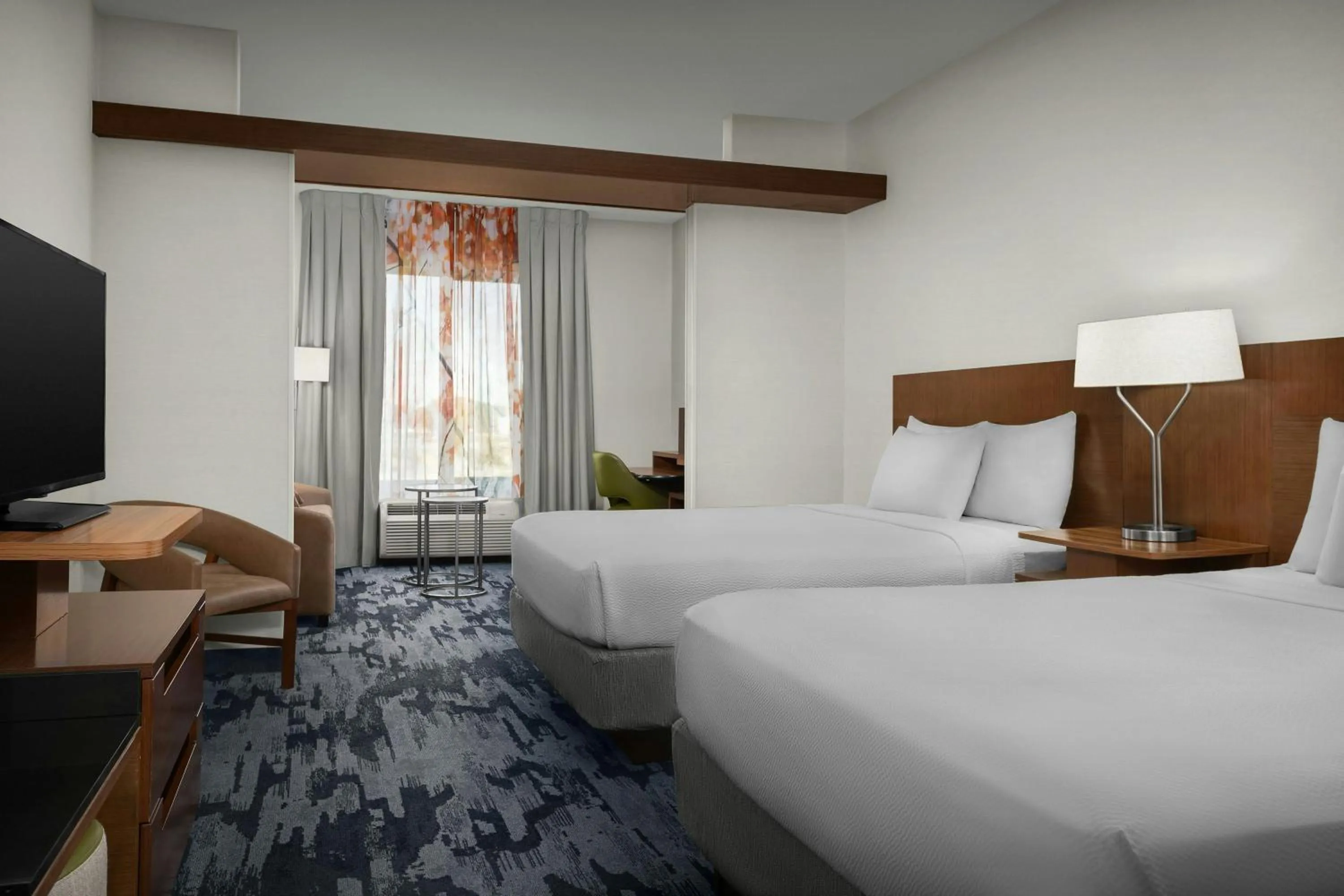 Photo of the whole room, Bed in Fairfield Inn & Suites by Marriott Atlanta Stockbridge