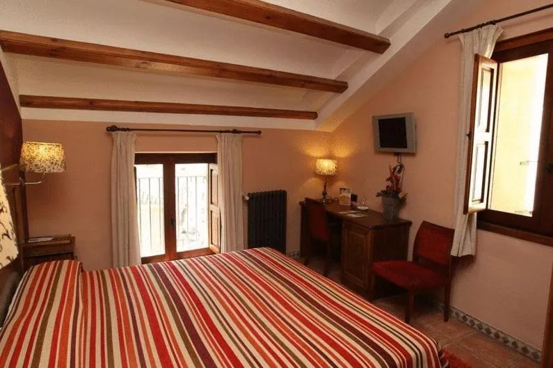 Photo of the whole room, Bed in Hotel Con Encanto La Façana