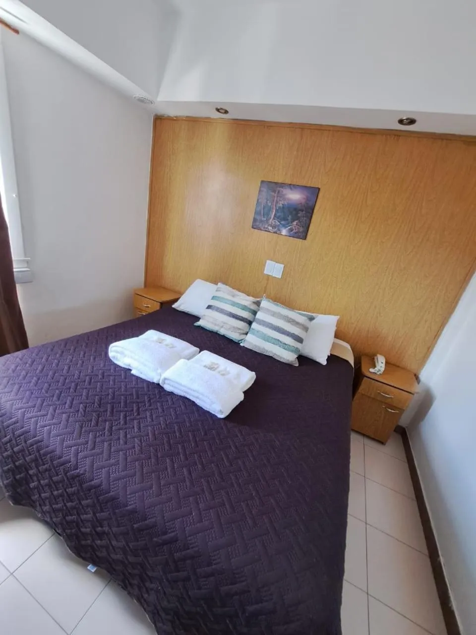 Bed in San Remo Grand Hotel