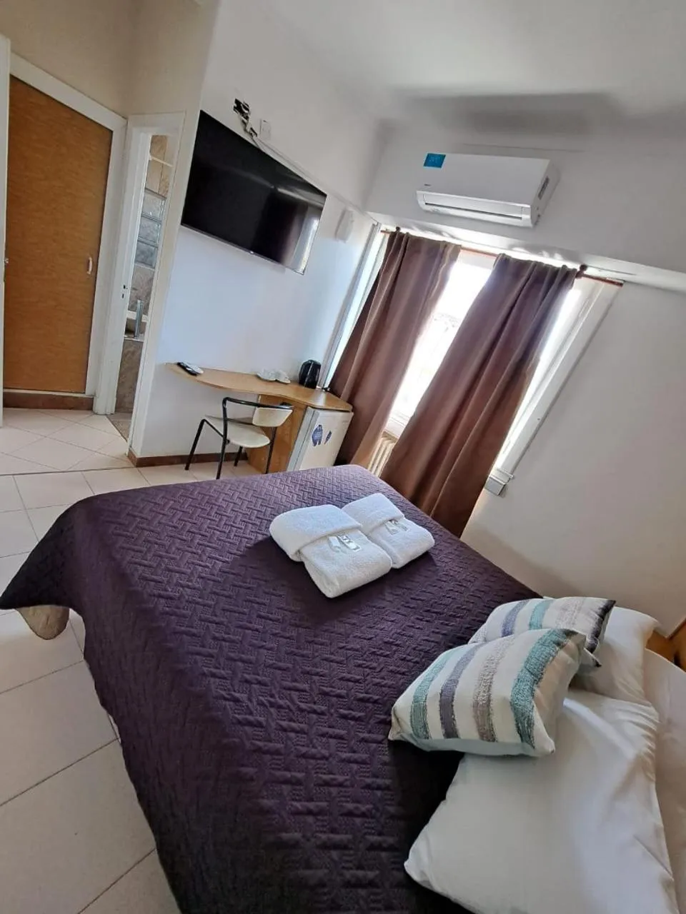 Bed in San Remo Grand Hotel