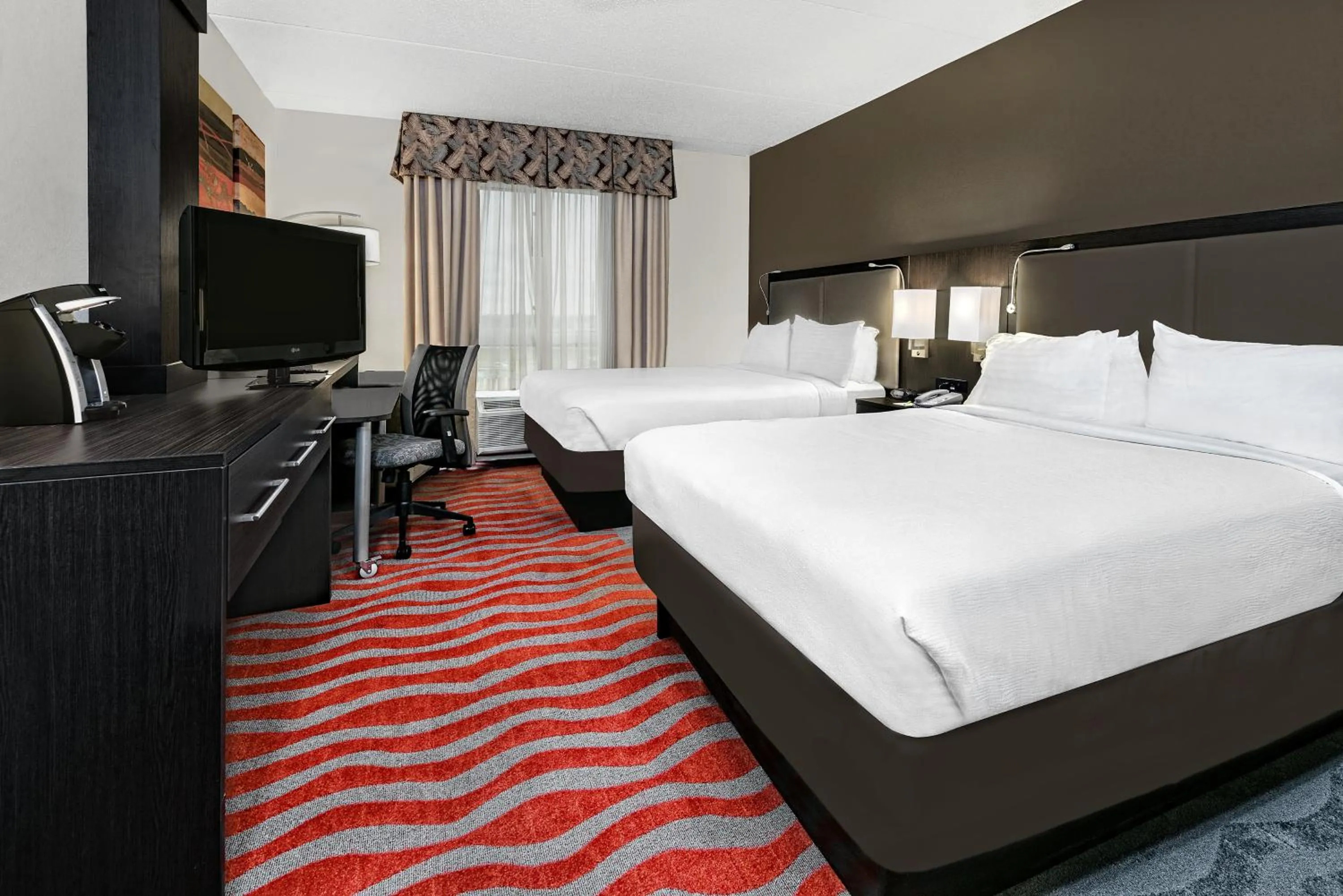 Photo of the whole room, Bed in Holiday Inn & Suites College Station-Aggieland by IHG