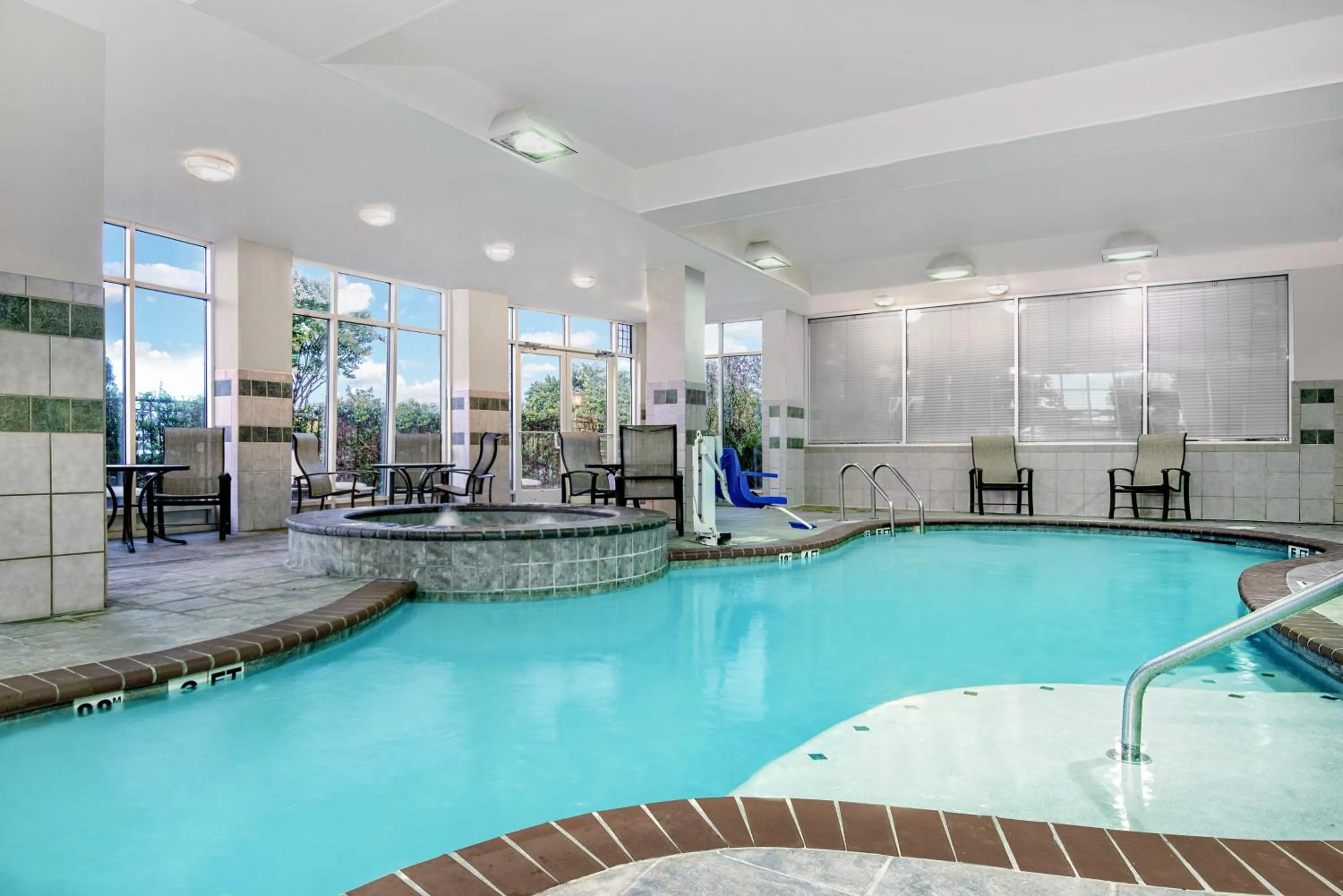 Swimming pool in Holiday Inn & Suites College Station-Aggieland by IHG