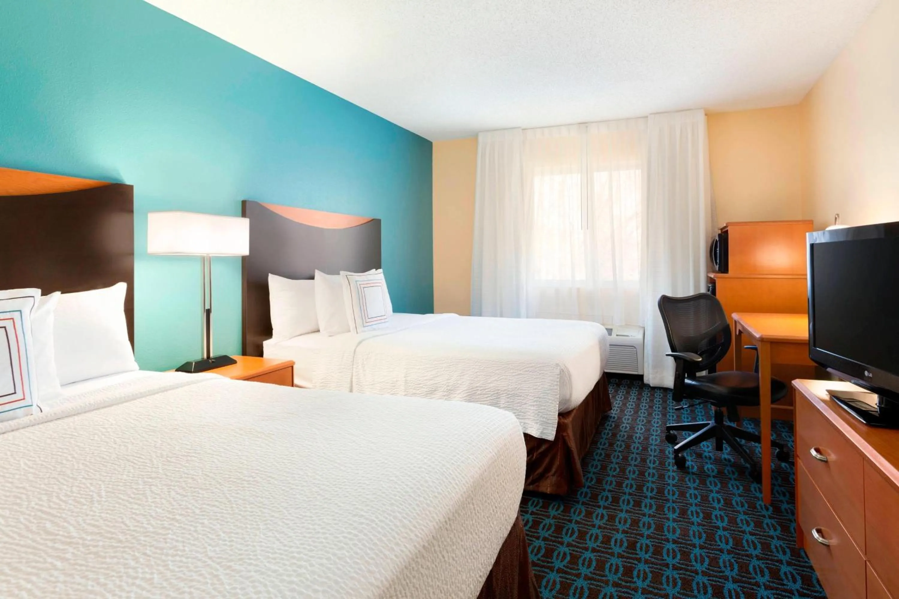 Photo of the whole room, Bed in Fairfield Inn & Suites Midland