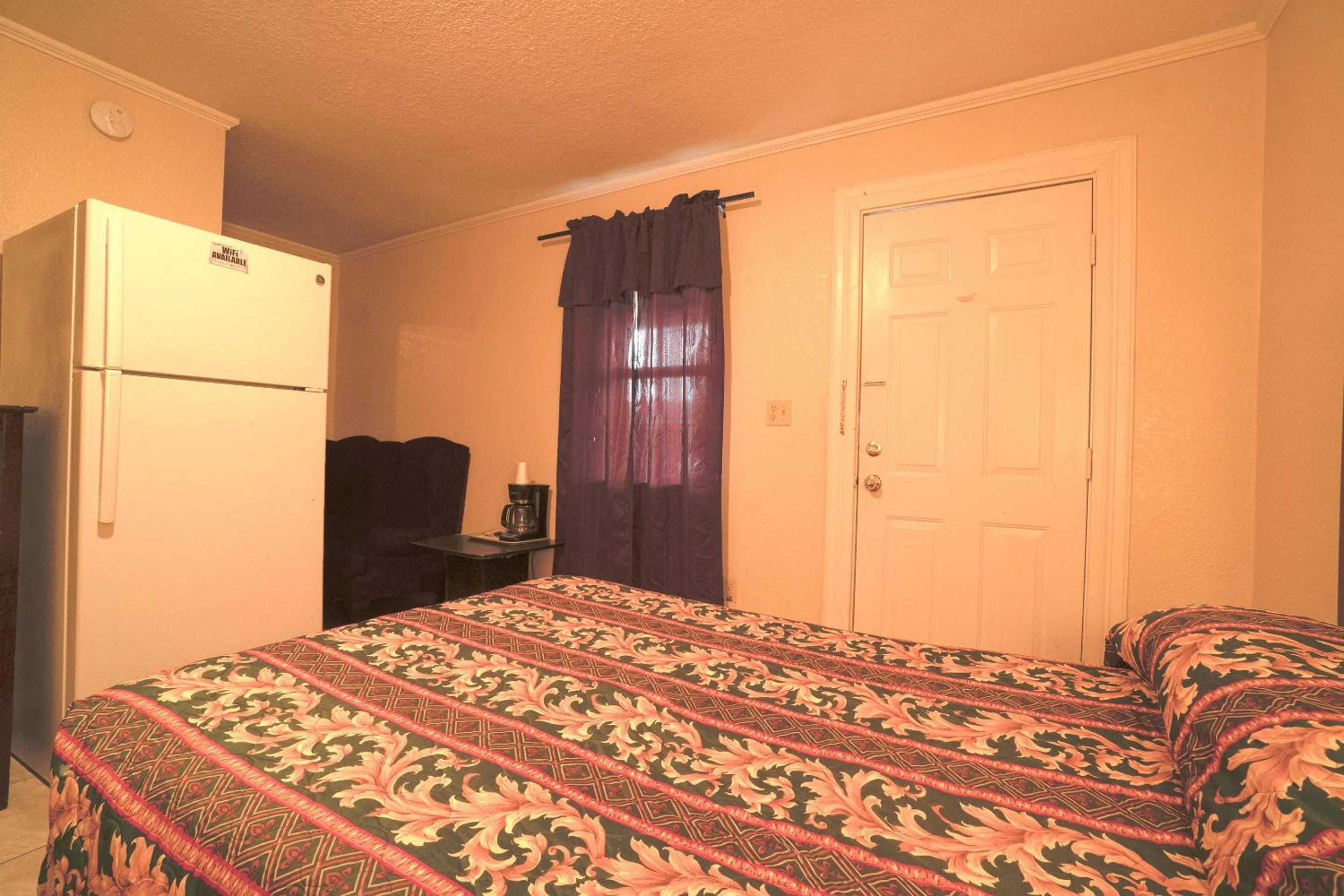 Bedroom, Bed in Texana Inn Edna By OYO