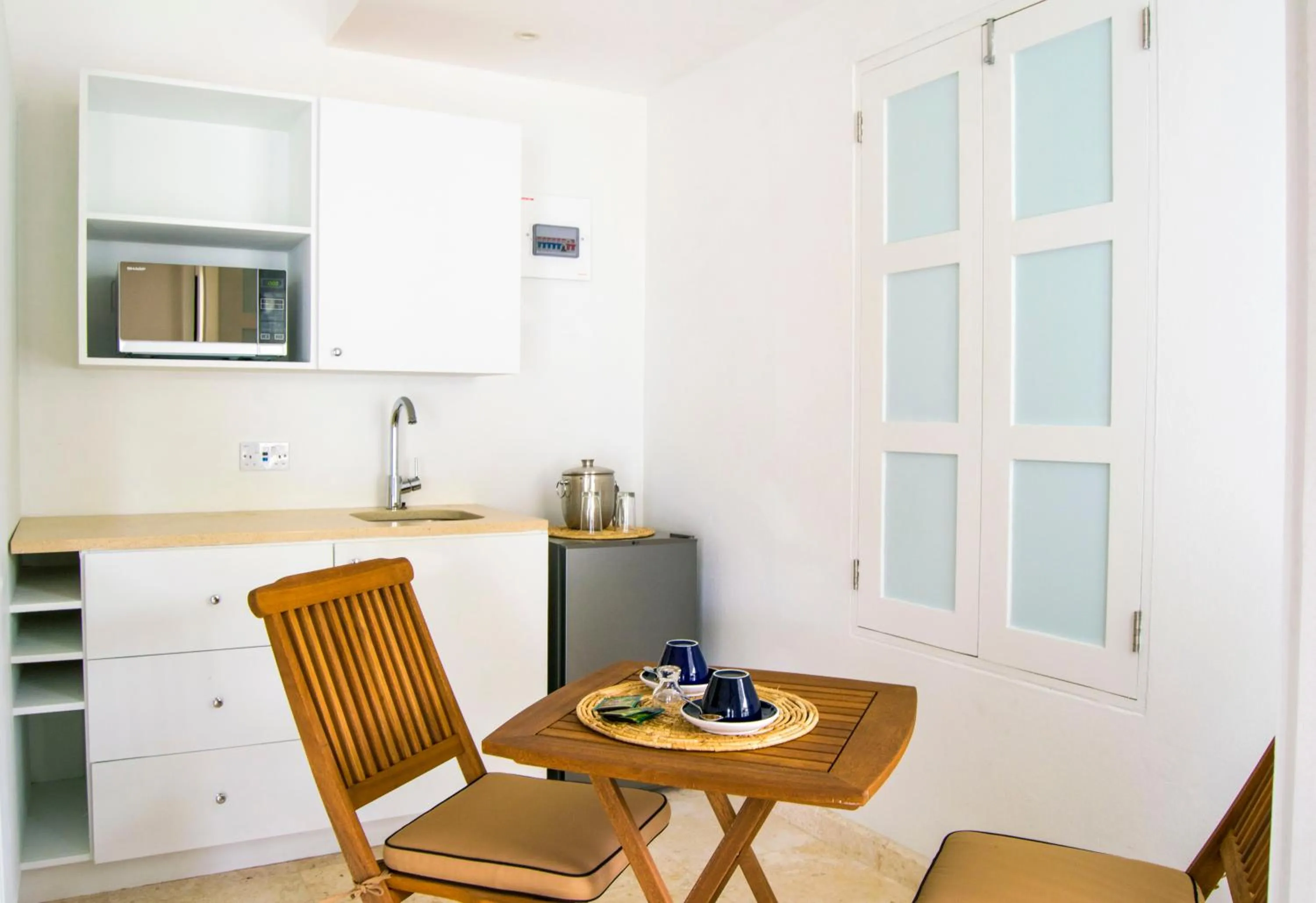 Kitchen or kitchenette in Bequia Plantation Hotel