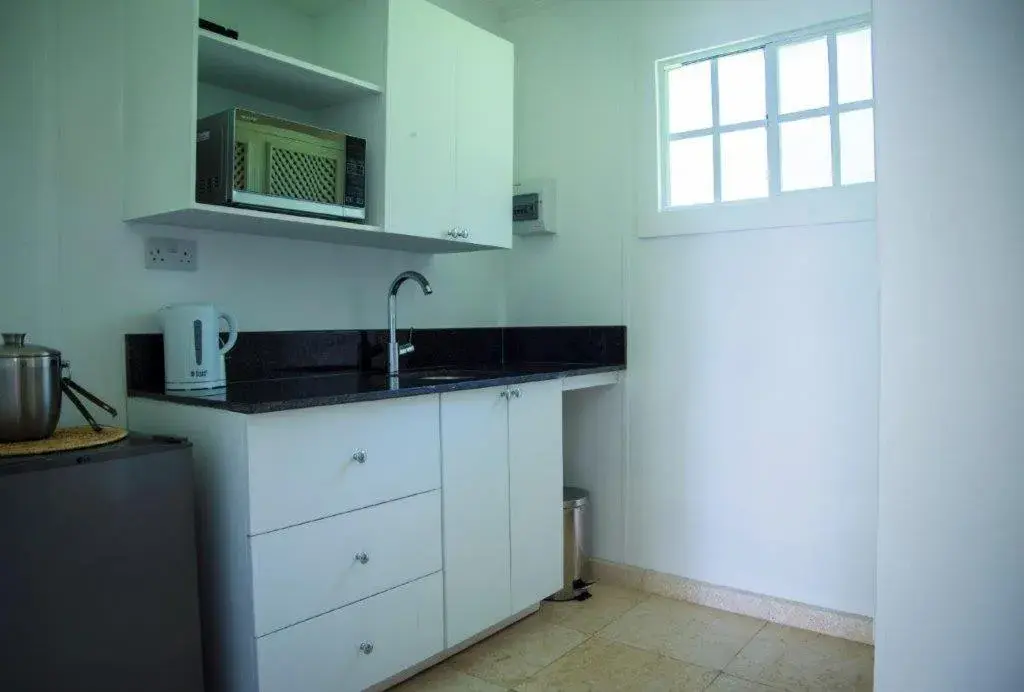 Orchard King Suite with Kitchenette in Bequia Plantation Hotel Orchard King Suite with Kitchenette in Bequia Plantation Hotel