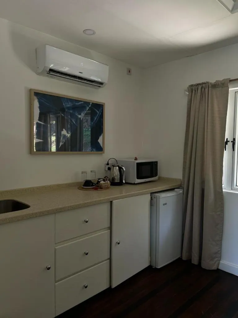 Kitchen or kitchenette in Bequia Plantation Hotel