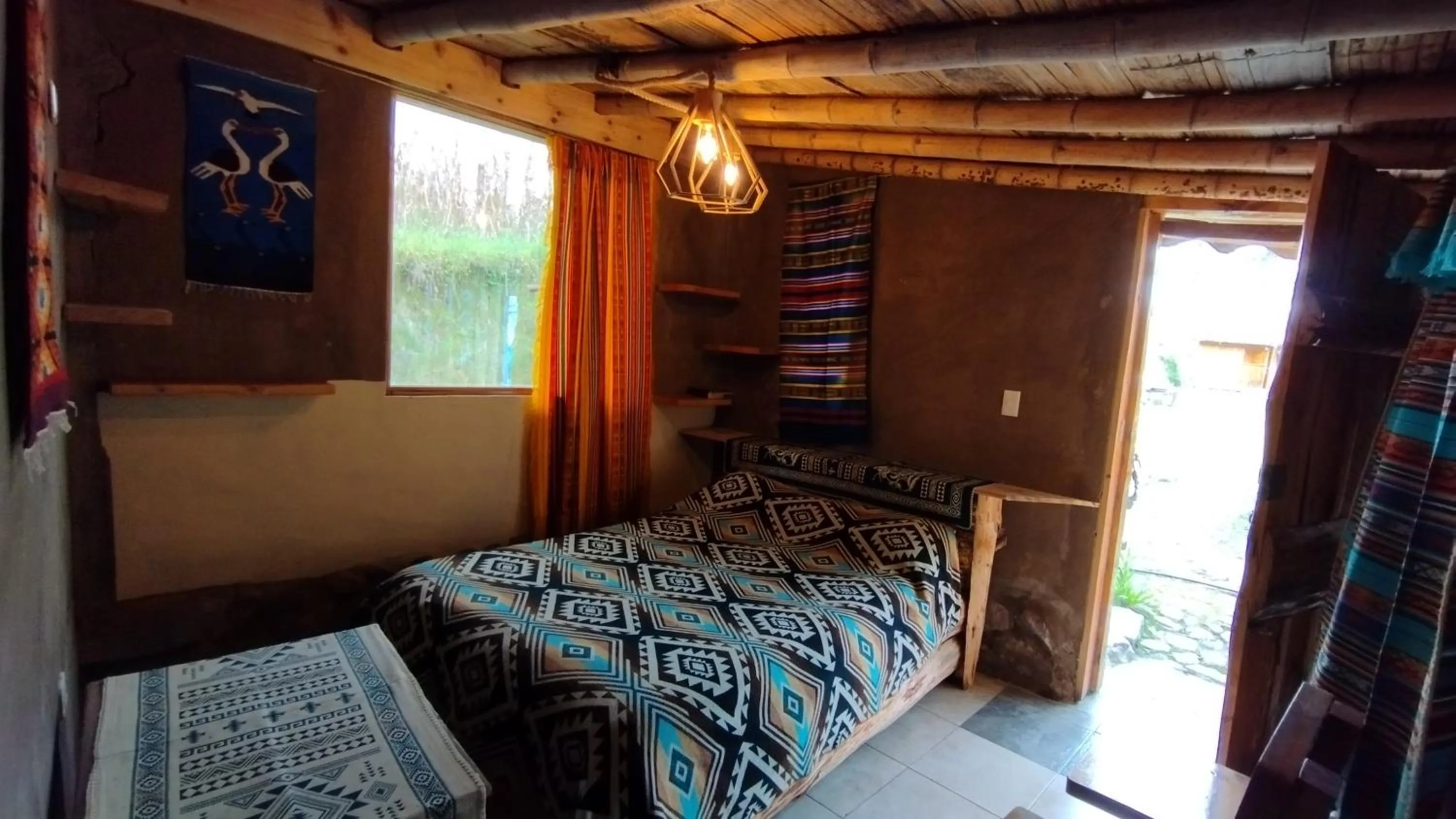 Bed in El Tio Hostal