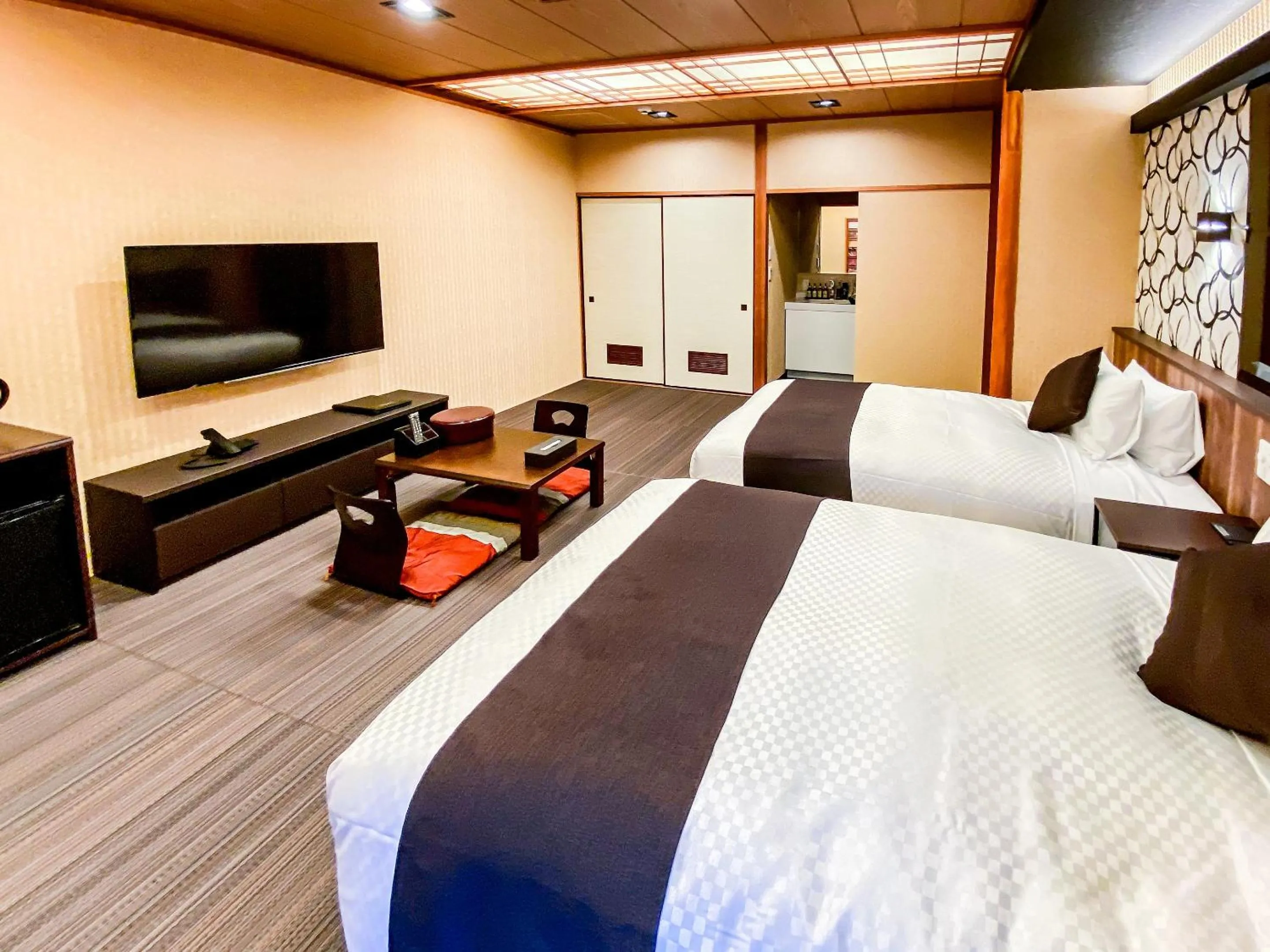 Photo of the whole room, Bed in LiVEMAX RESORT Okudogo
