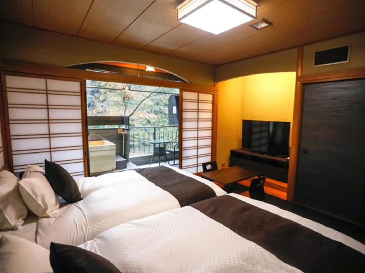 Photo of the whole room, Bed in LiVEMAX RESORT Okudogo