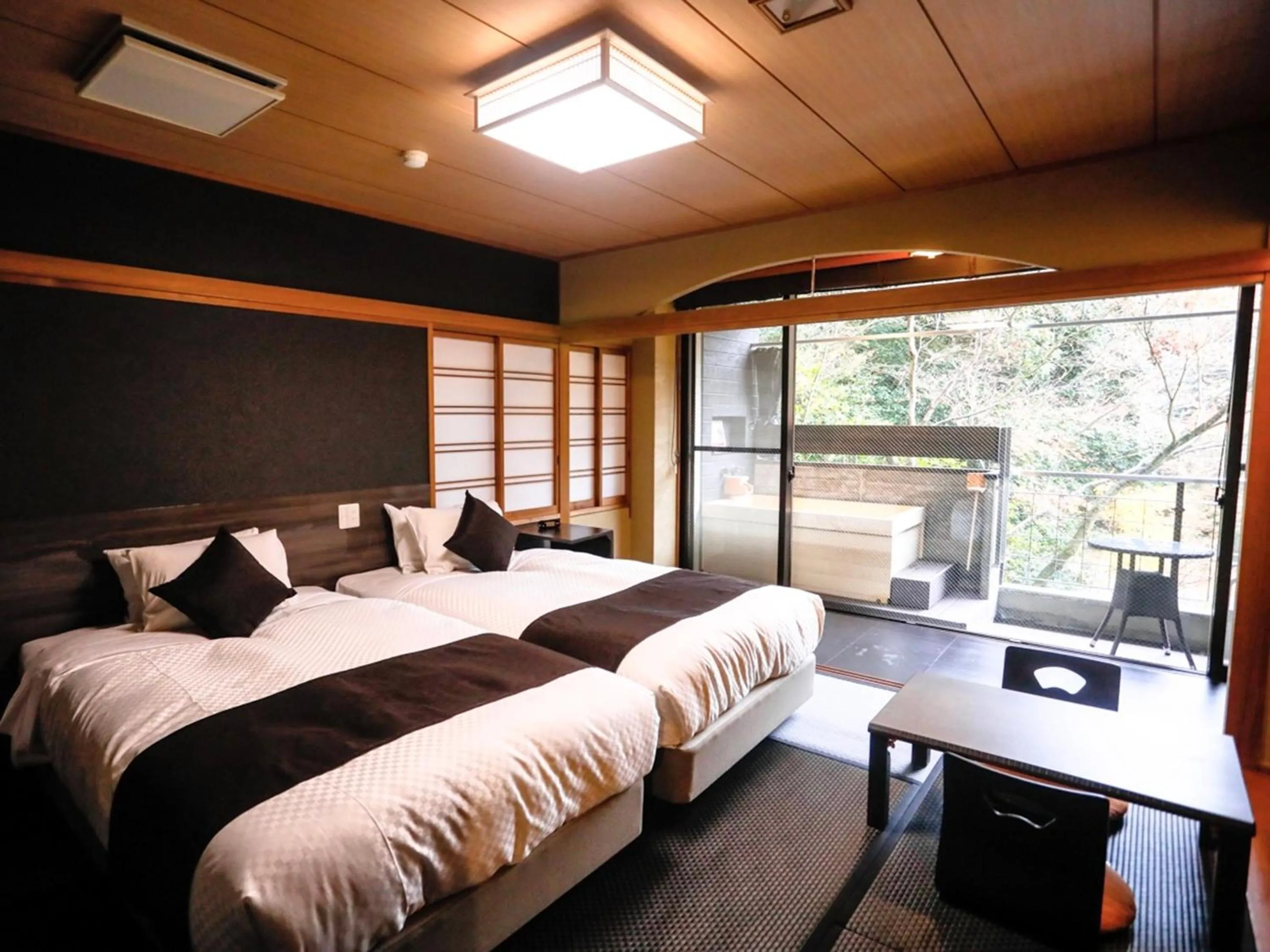 Photo of the whole room, Bed in LiVEMAX RESORT Okudogo