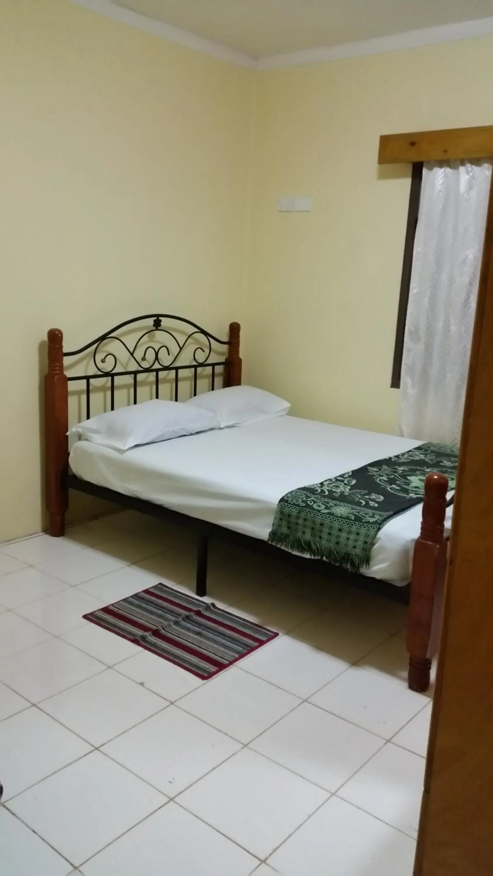 Bed in Westfield Homestay Fiji