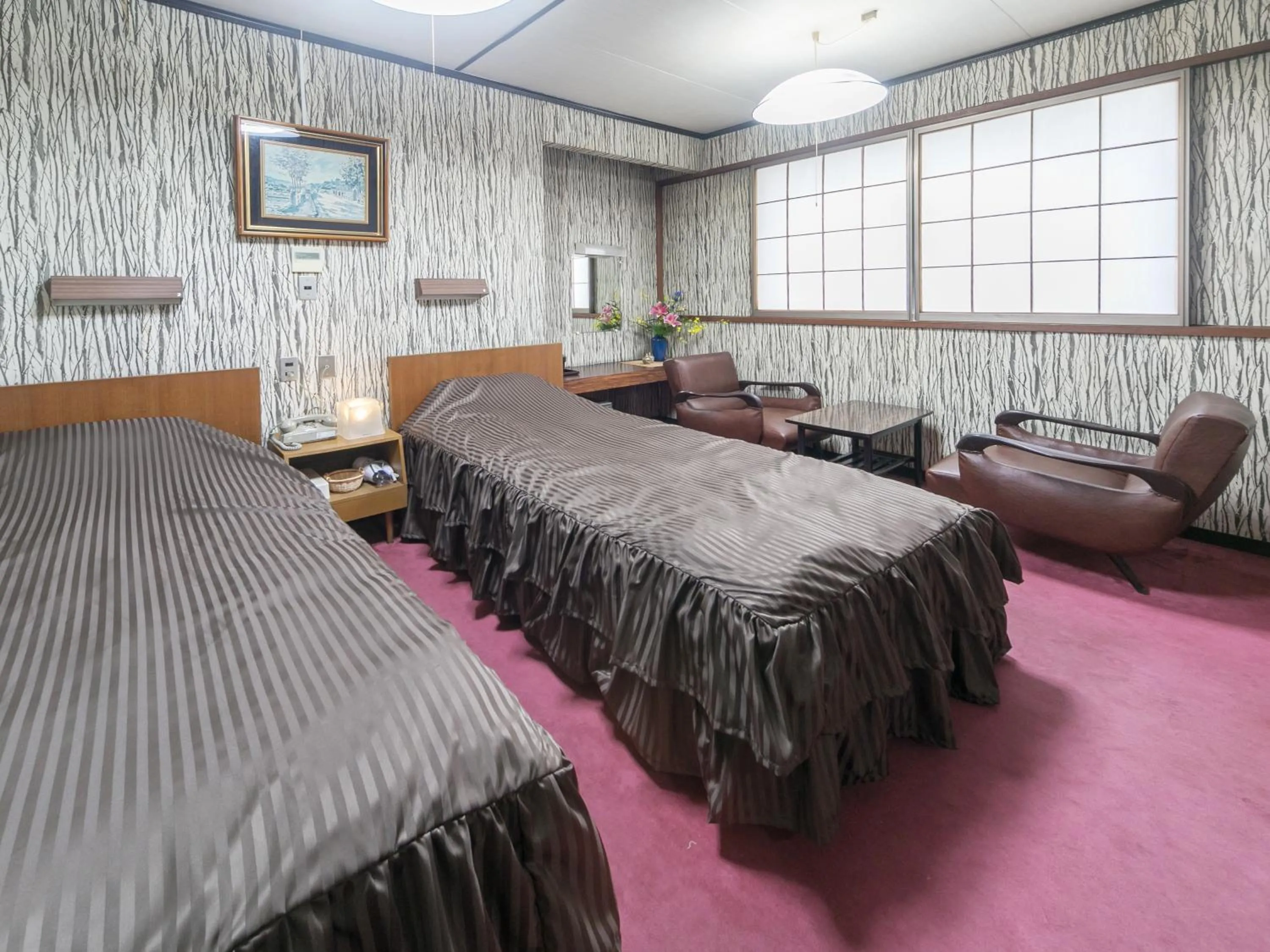 Photo of the whole room, Bed in Riverside Hotel Shoei