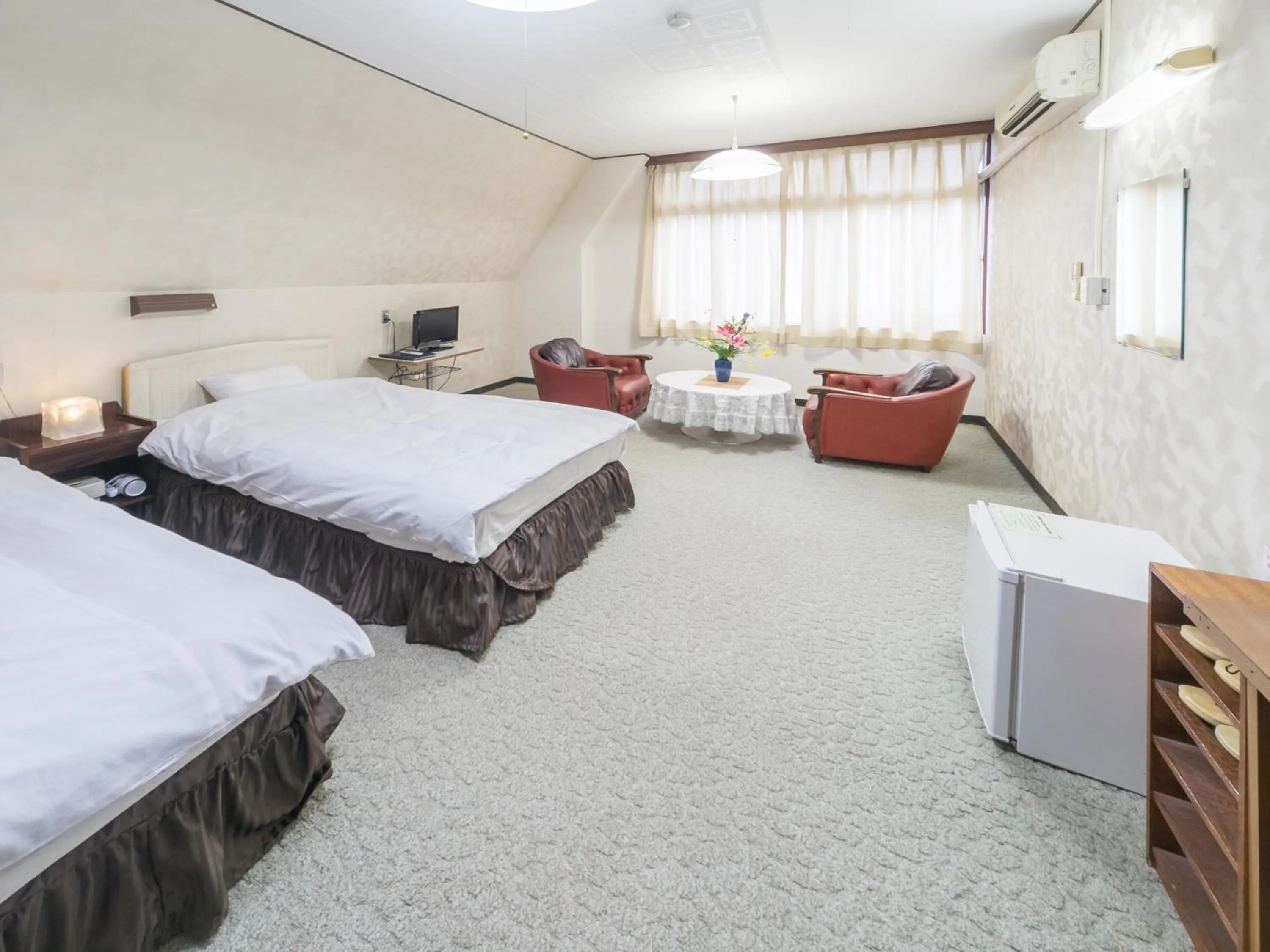 Photo of the whole room, Bed in Riverside Hotel Shoei