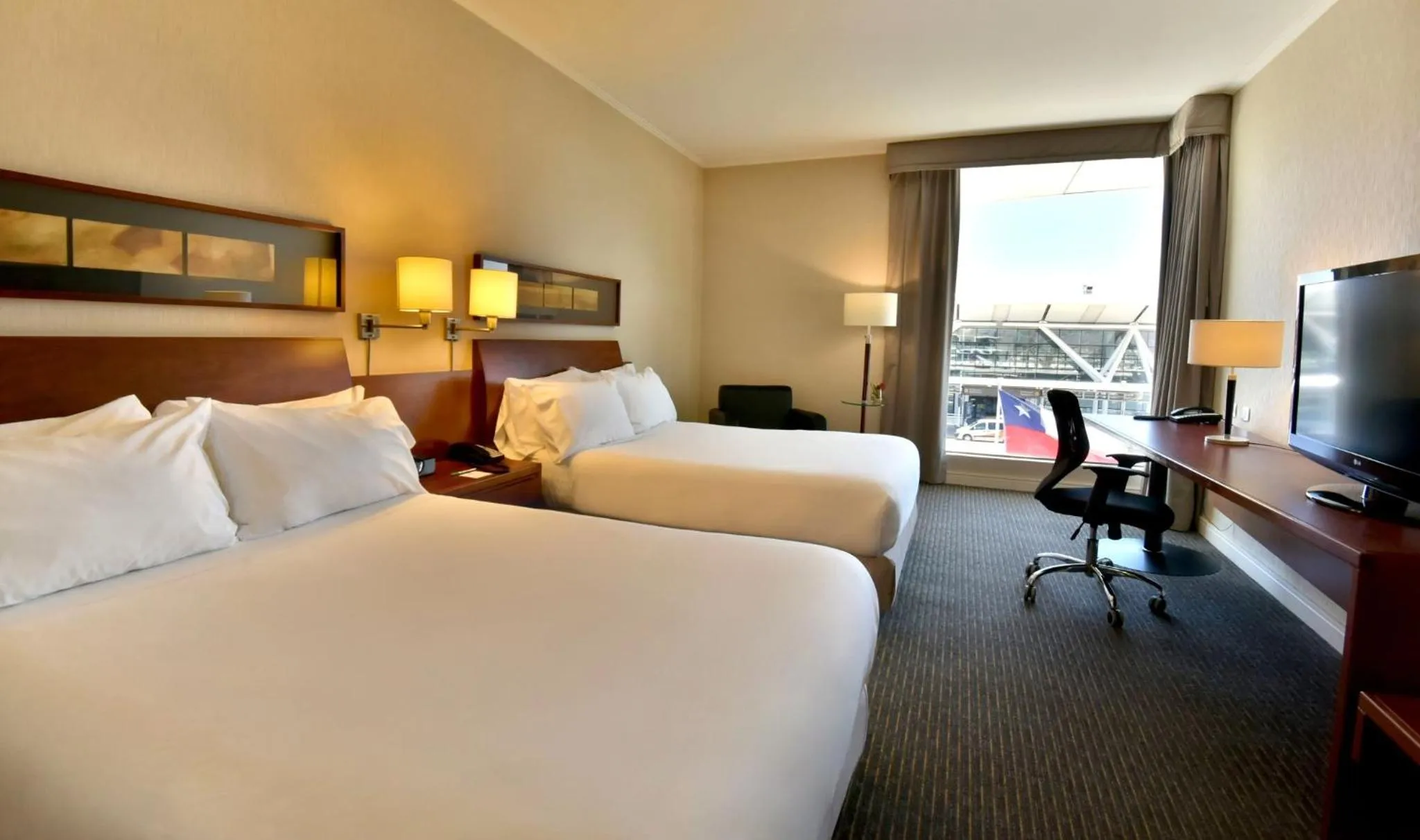 Photo of the whole room, Bed in Holiday Inn Santiago - Airport Terminal by IHG