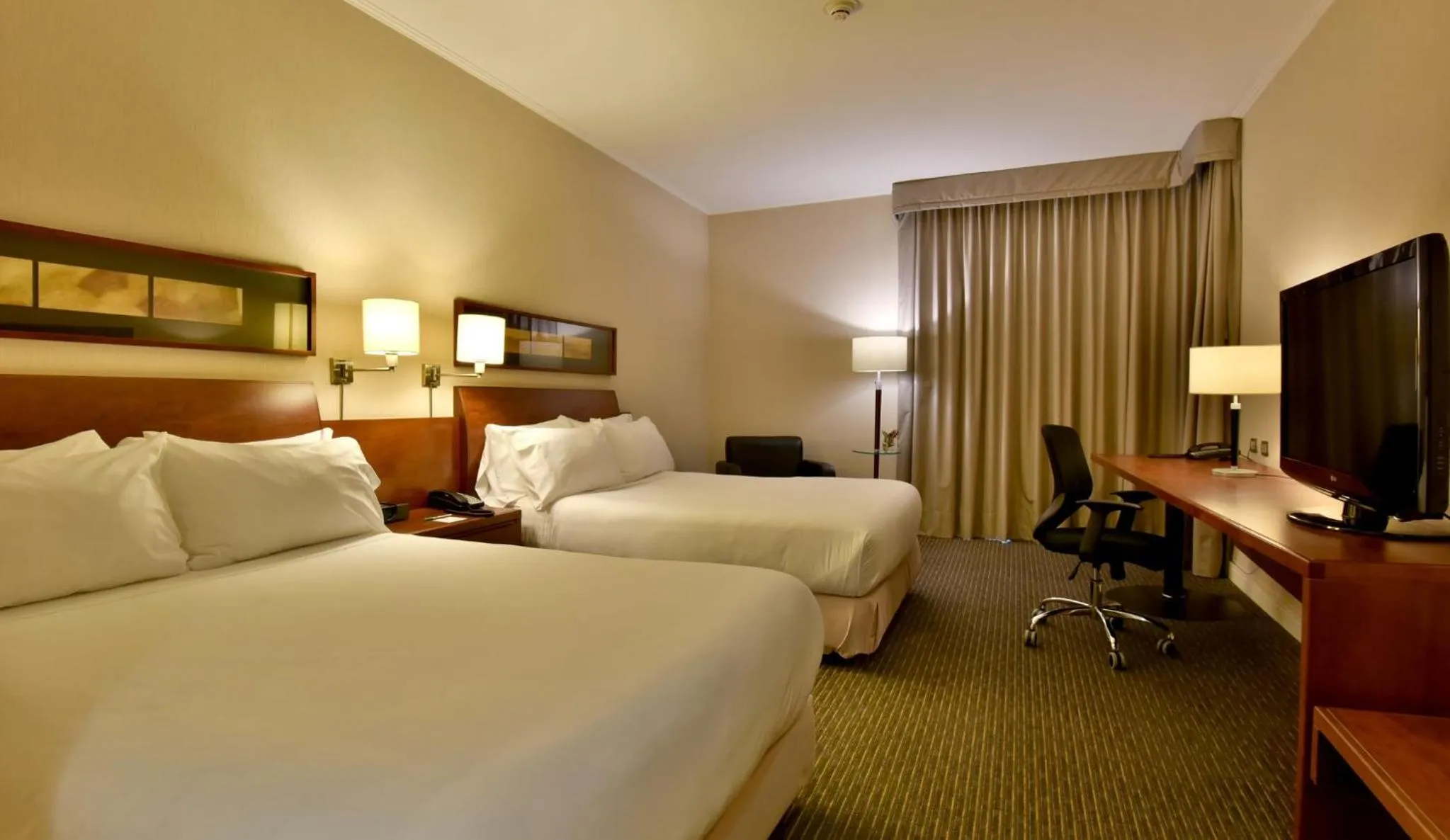 Photo of the whole room, Bed in Holiday Inn Santiago - Airport Terminal by IHG