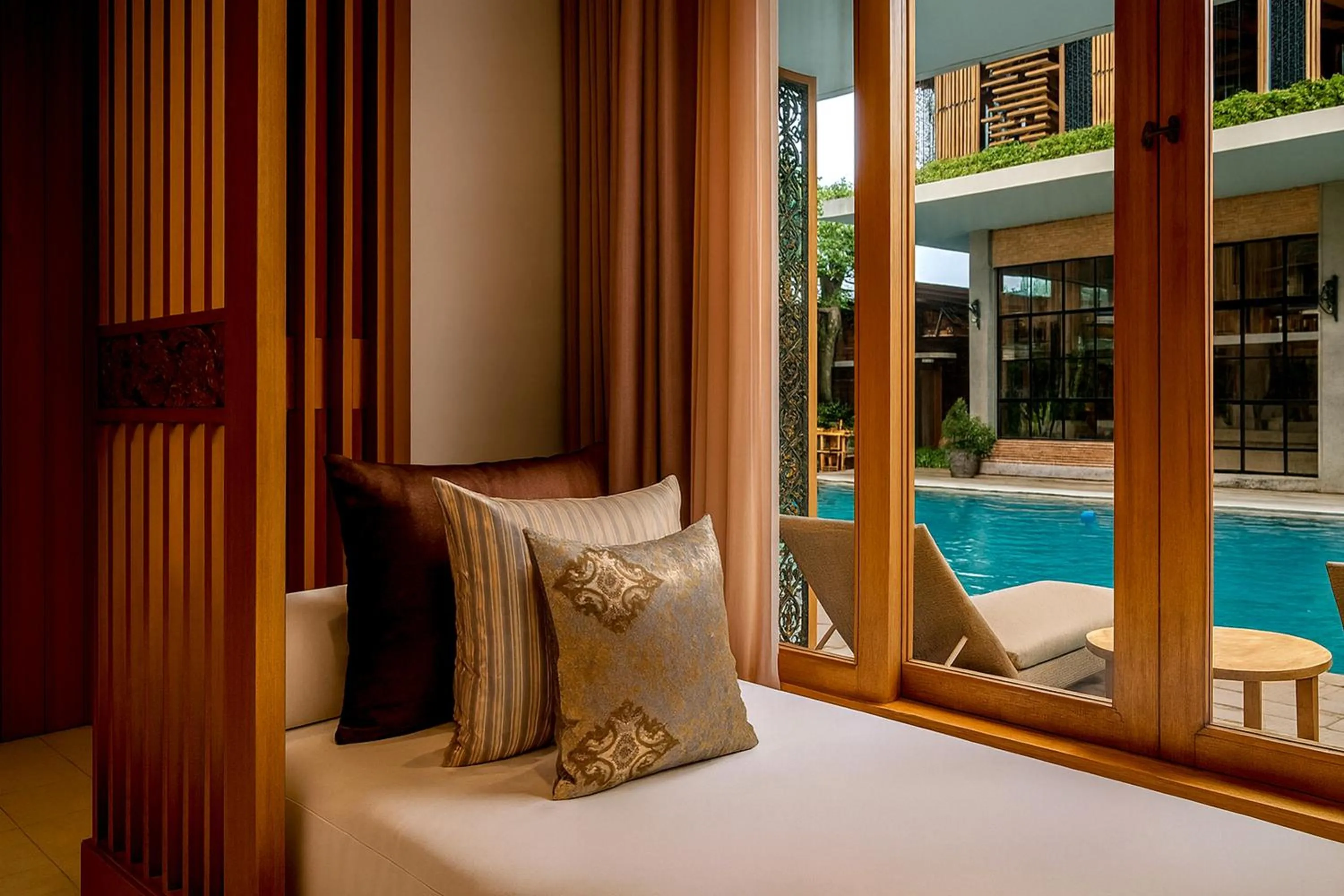 Pool view, Bed in Swarga Suites Bali Berawa, Marclan Collection