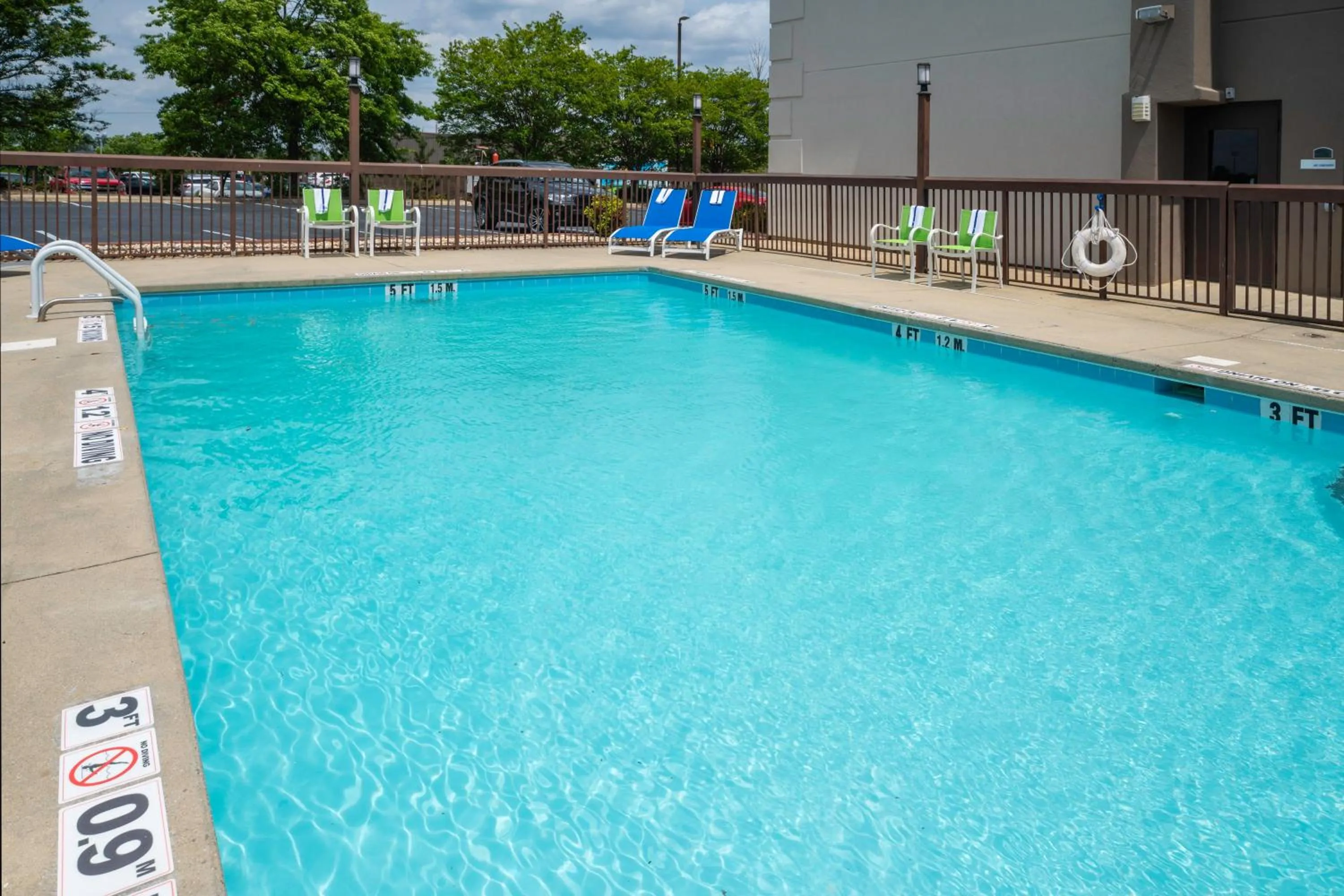 Swimming pool in Holiday Inn Express Clayton Southeast Raleigh by IHG