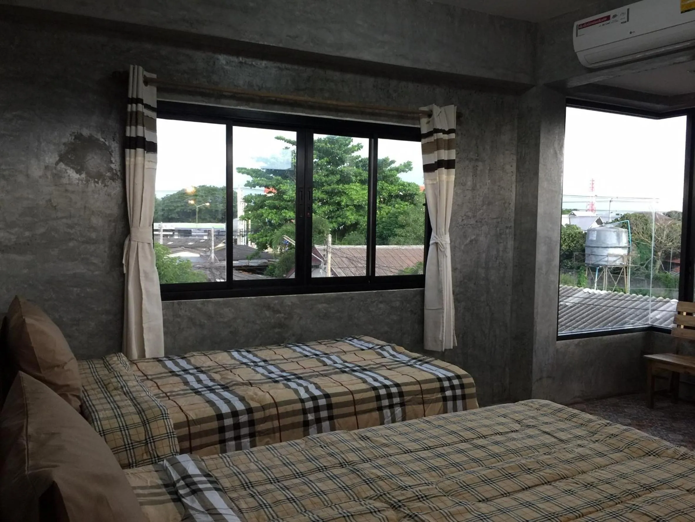 Bed in Chiangmai HomeTeL