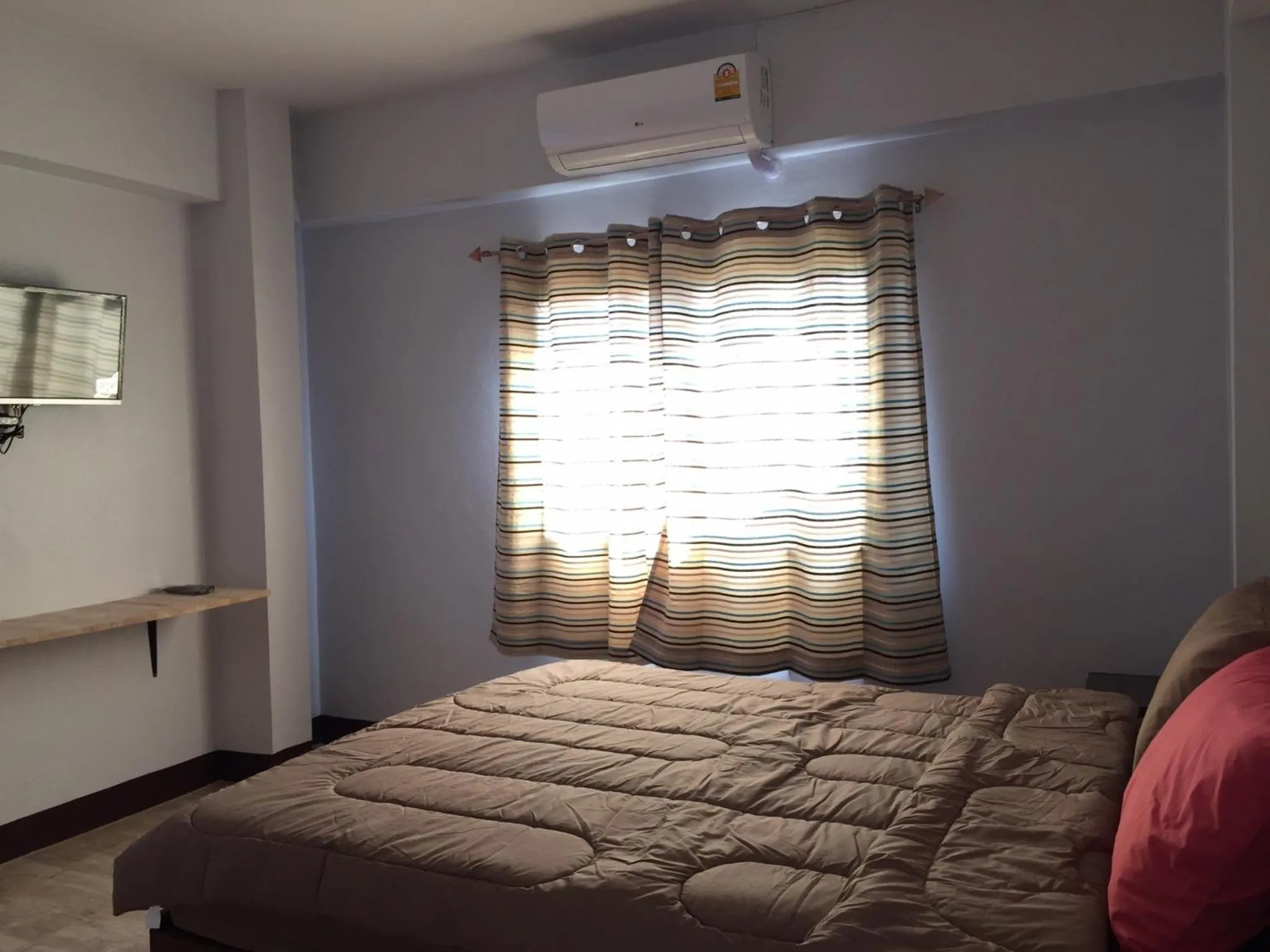 Bed in Chiangmai HomeTeL