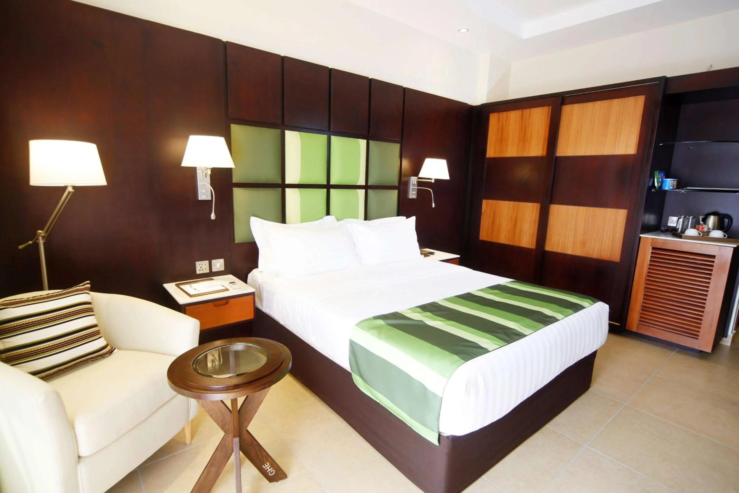 Photo of the whole room, Bed in Best Western Premier Garden Hotel Entebbe