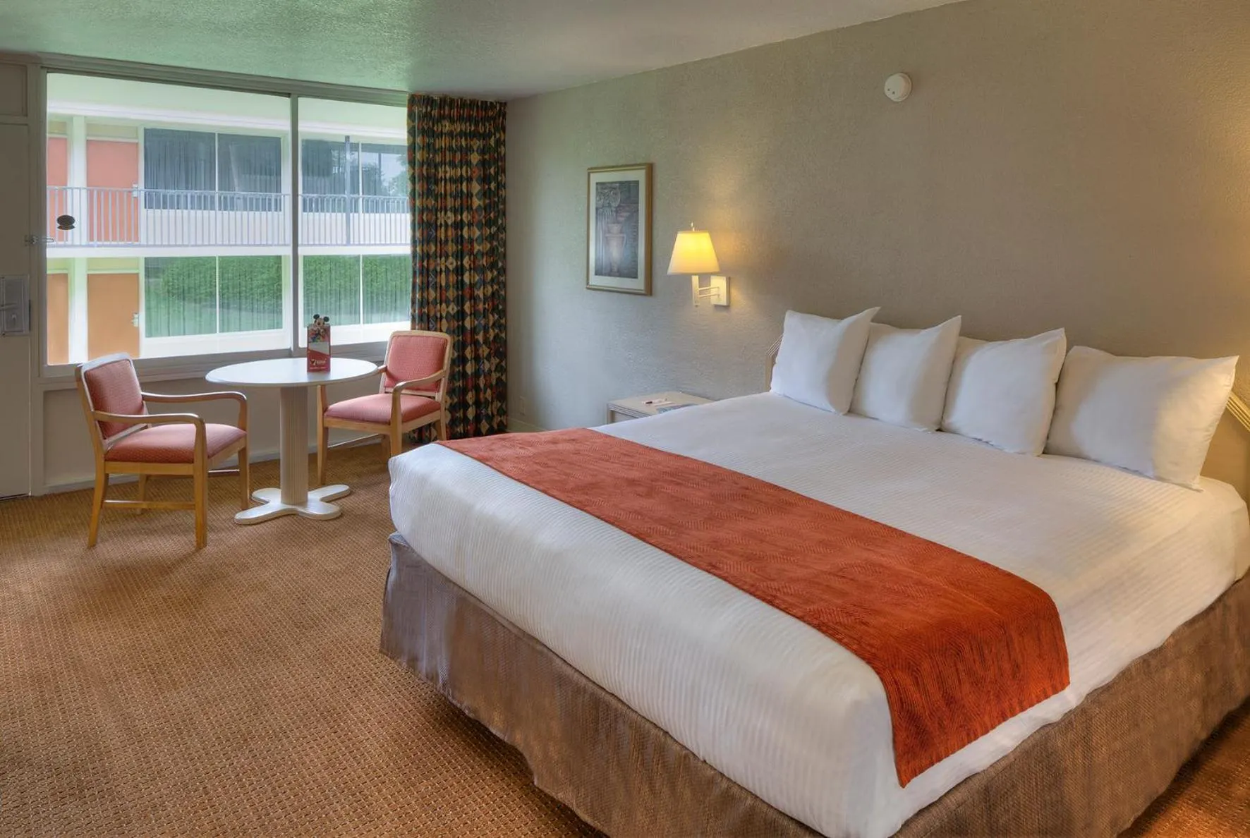 Bed in Ramada by Wyndham Kissimmee Gateway - Free Theme Park Shuttle