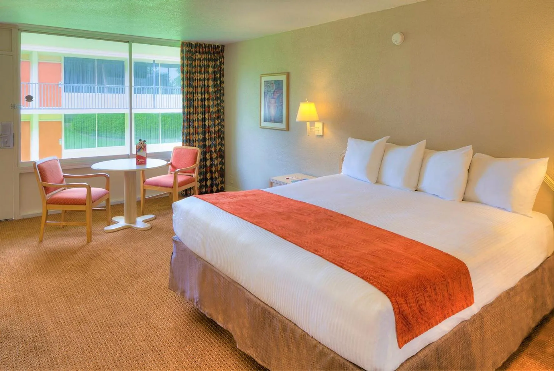 Photo of the whole room, Bed in Ramada by Wyndham Kissimmee Gateway - Free Theme Park Shuttle