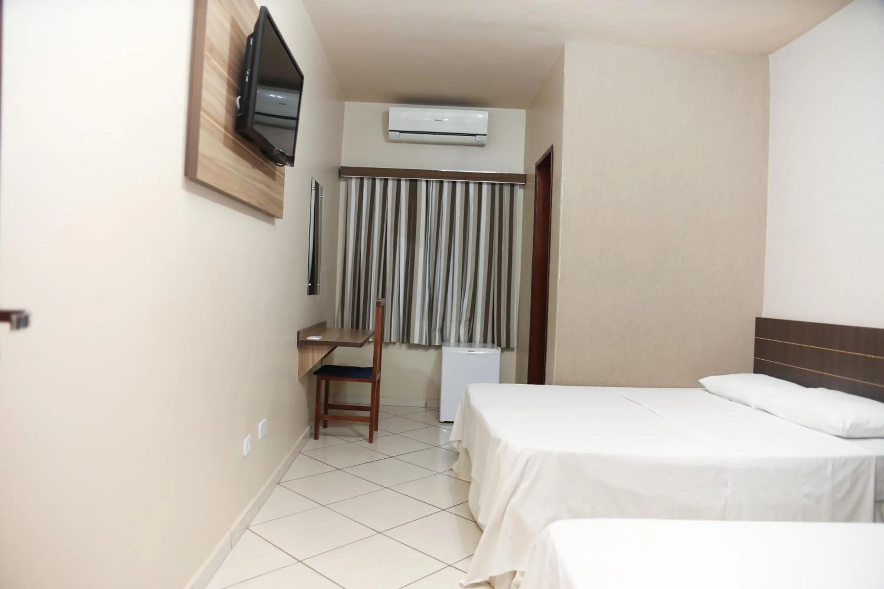 Bed in Hotel Villa Canoas