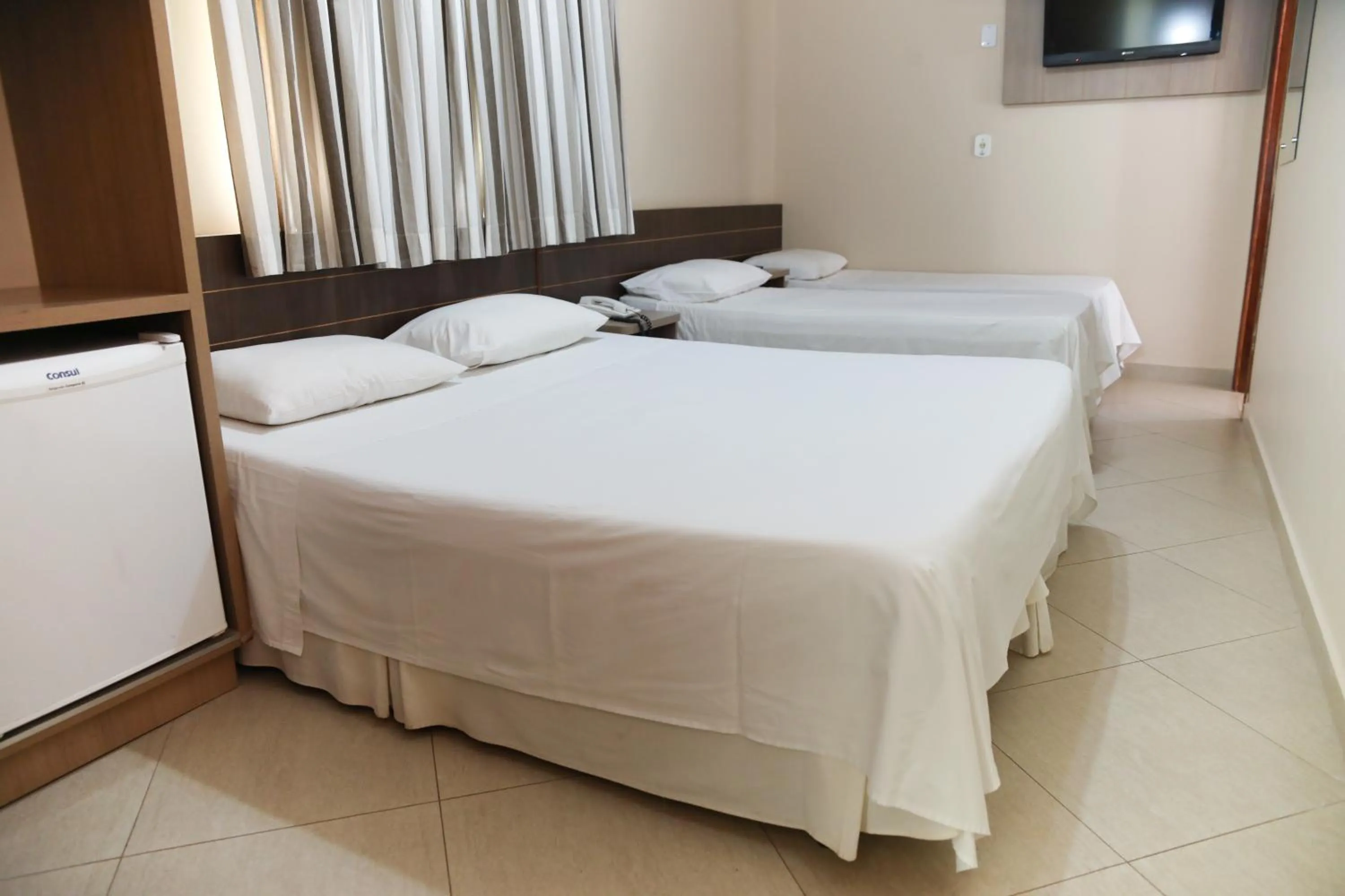Bed in Hotel Villa Canoas