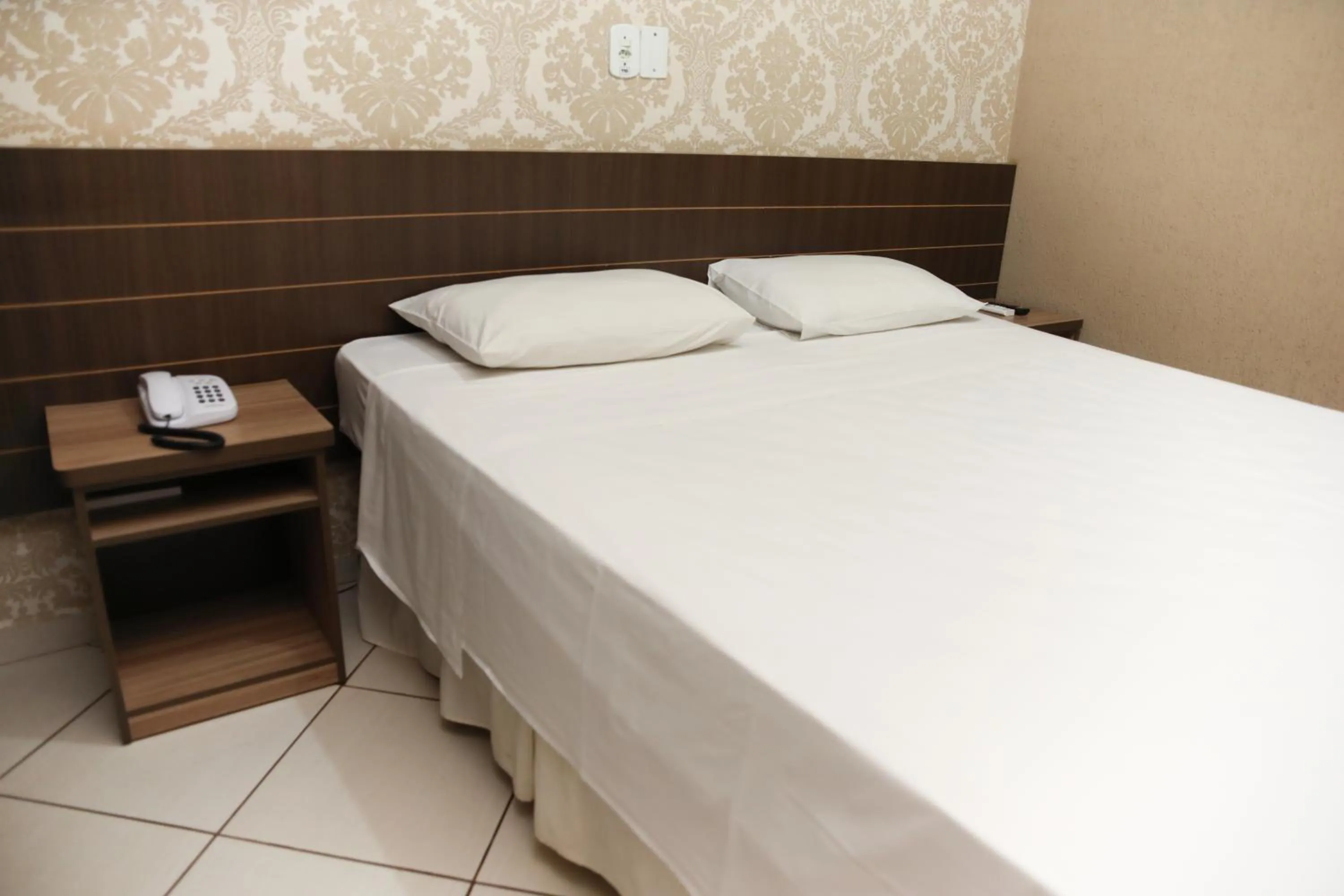 Bed in Hotel Villa Canoas